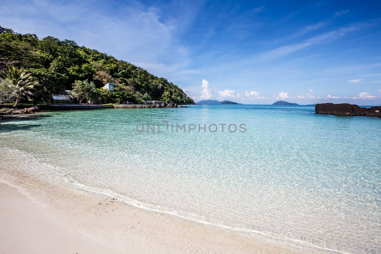 white sand and blue sky on beautiful beach