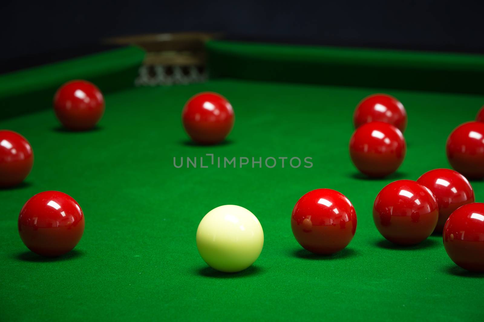 snooker balls set on a green table