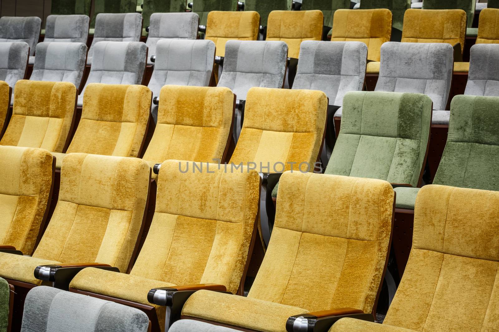 vacant theater chair in  hall