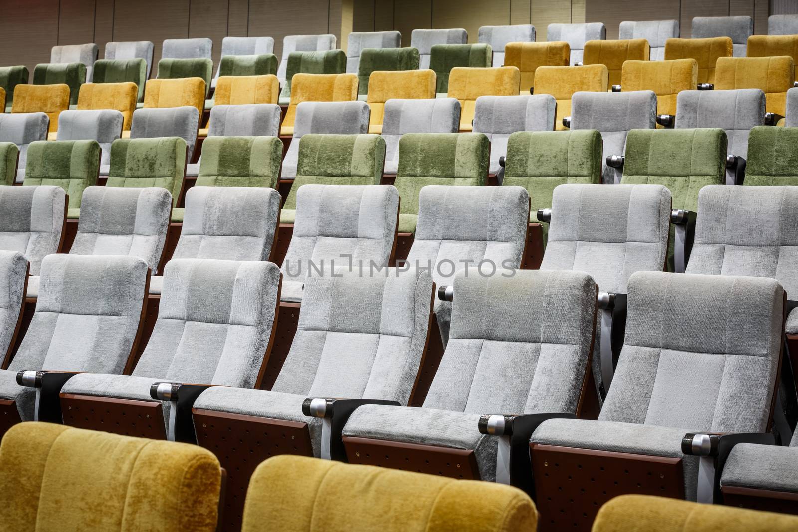 vacant theater chair in  hall