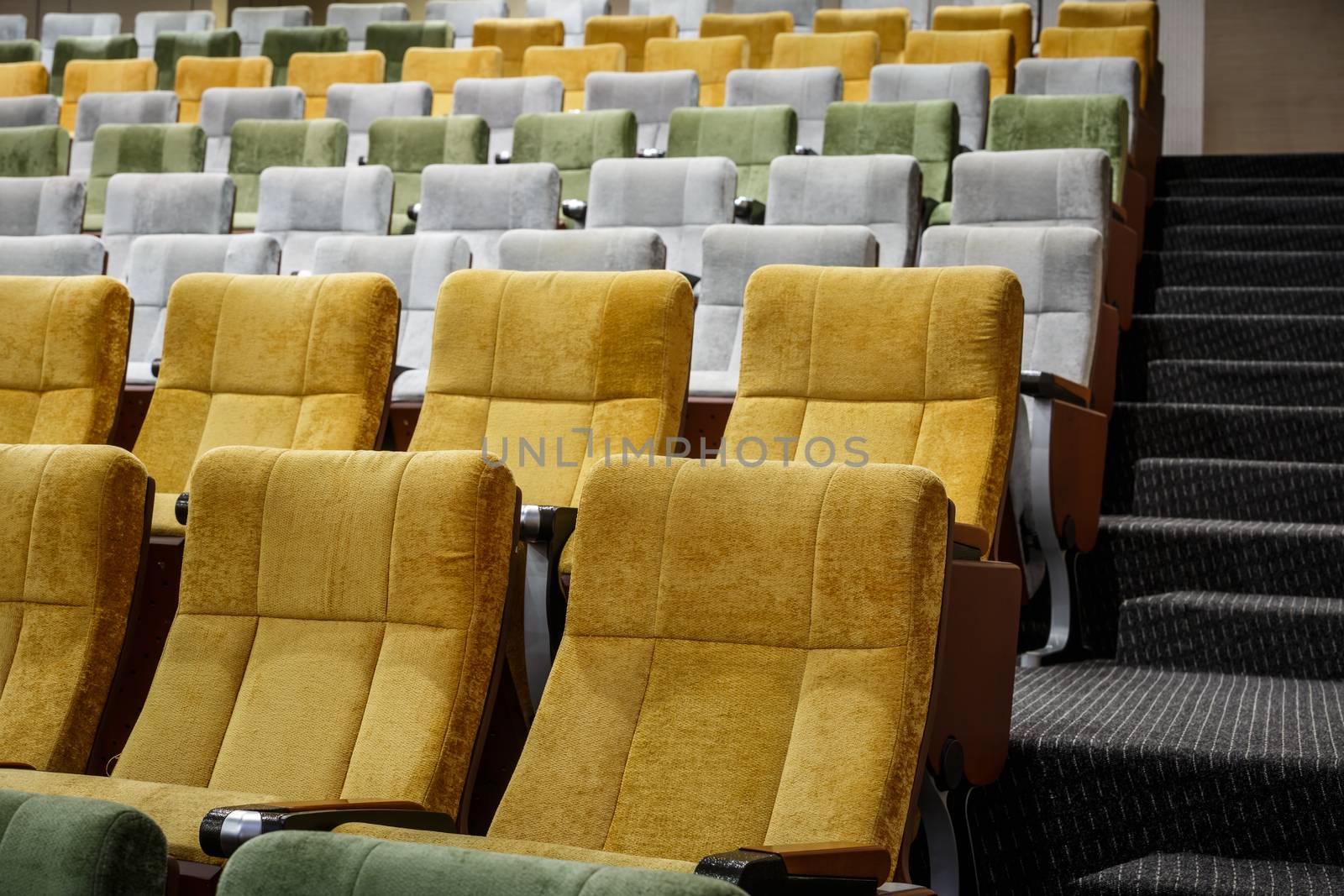 vacant theater chair in  hall