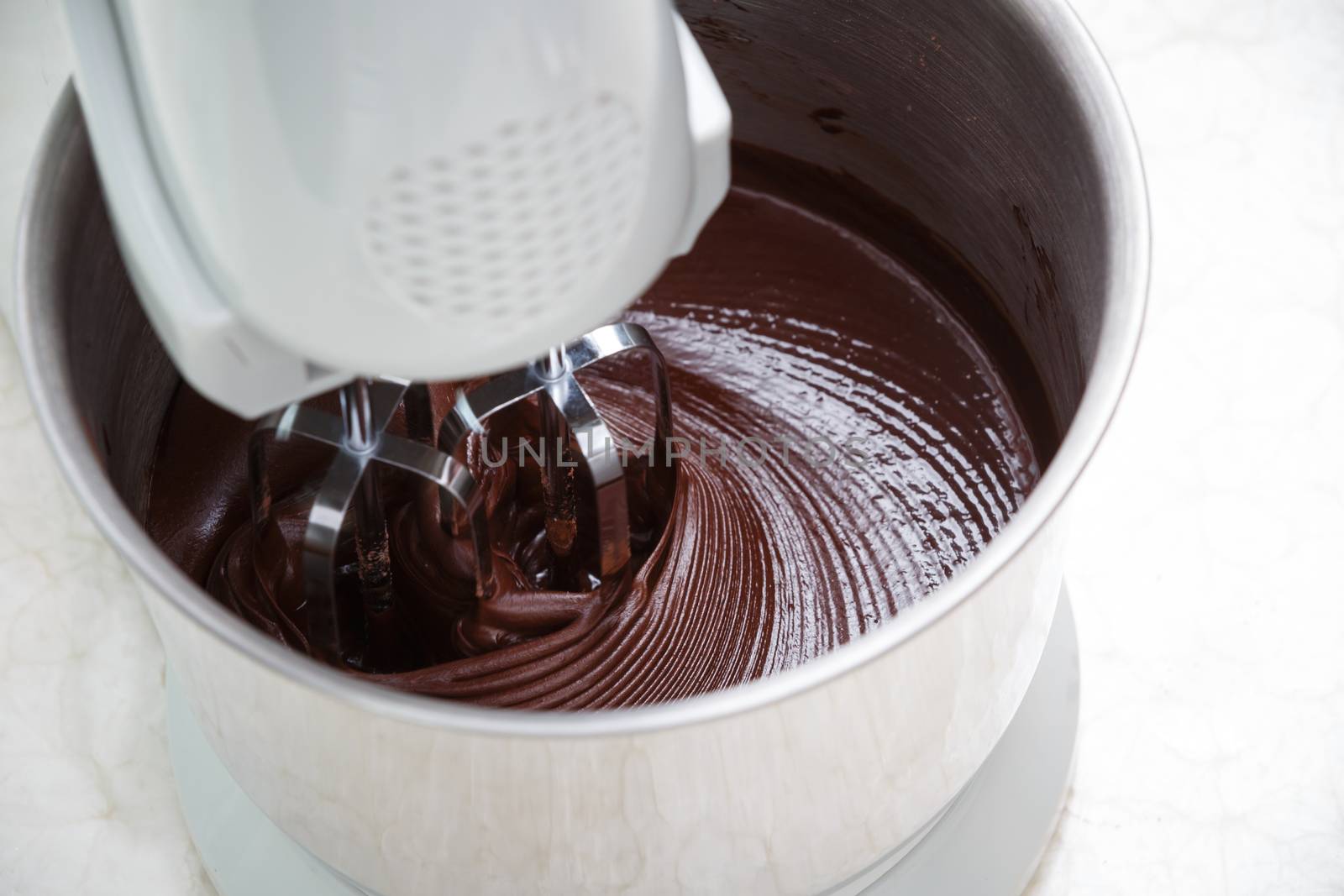 mixing chocolate dough with dough mixer