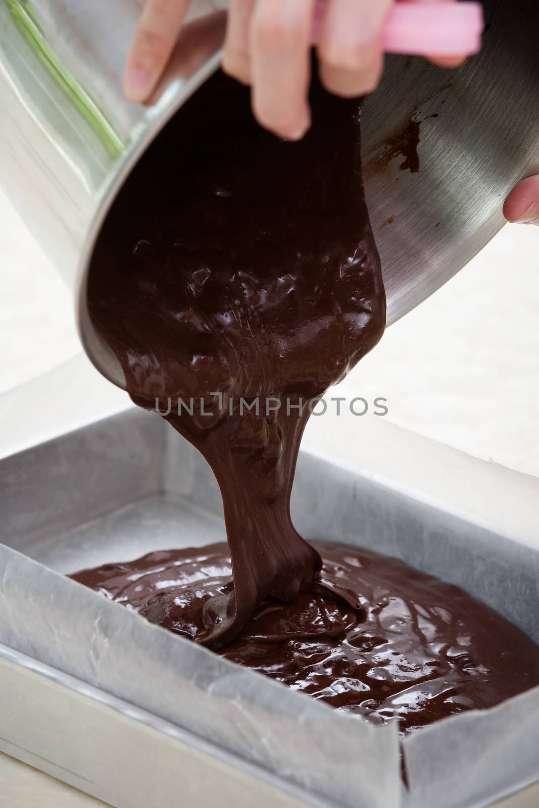 pour brownie to tray