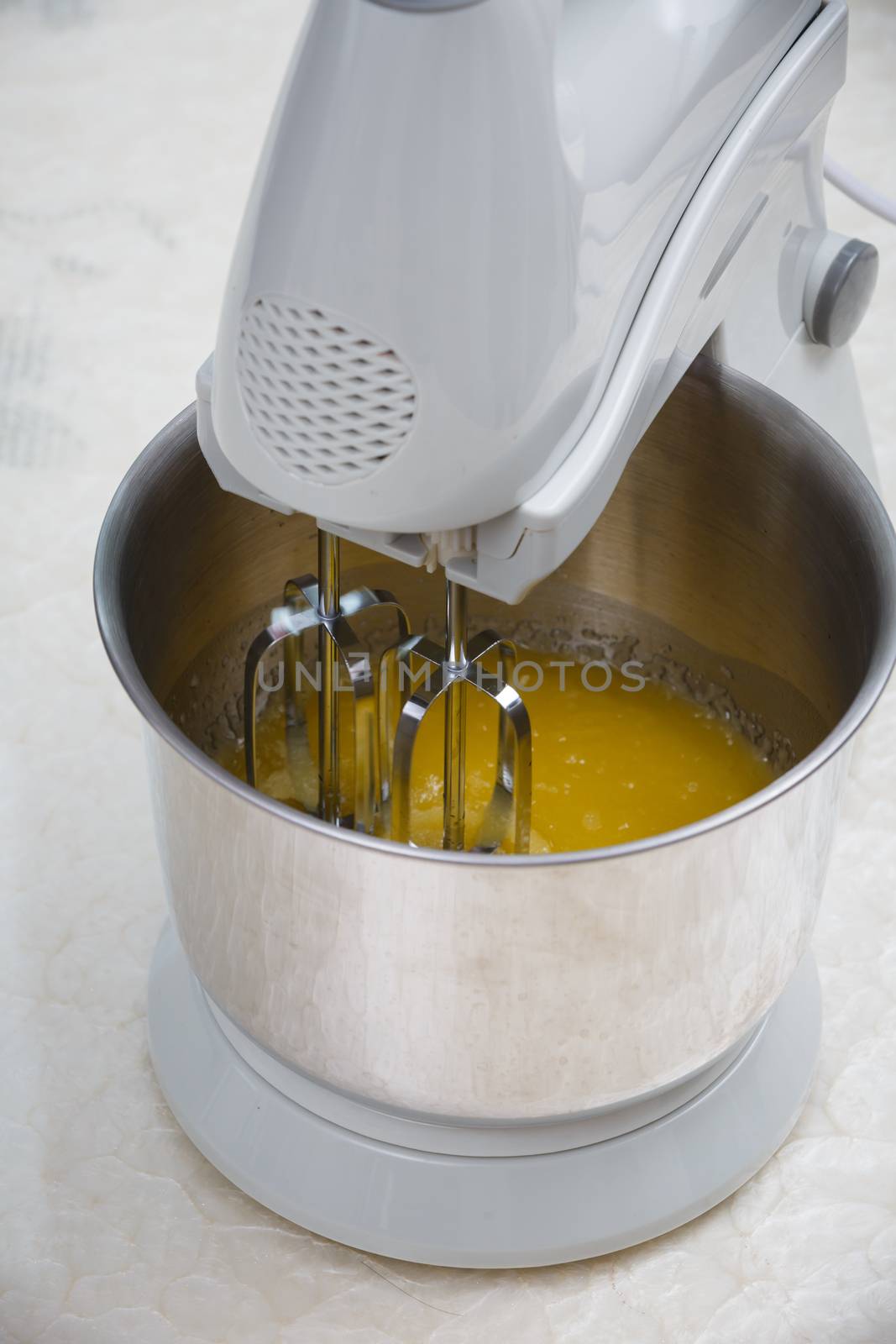 mixing butter with dough mixer