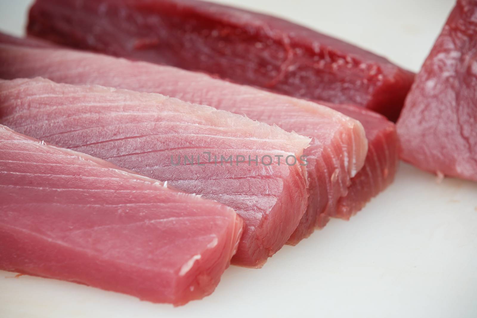cuted tuna on a white table