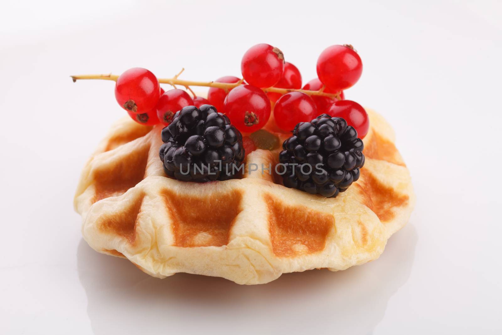 vaniila waffle with mix berry for breakfast