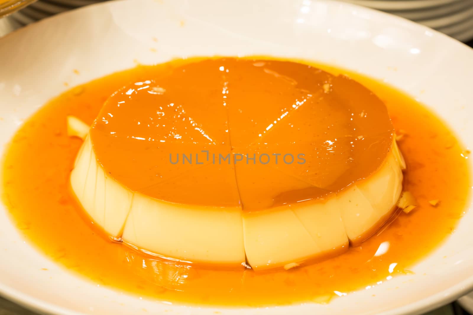 golden custard topping with caramel sauce