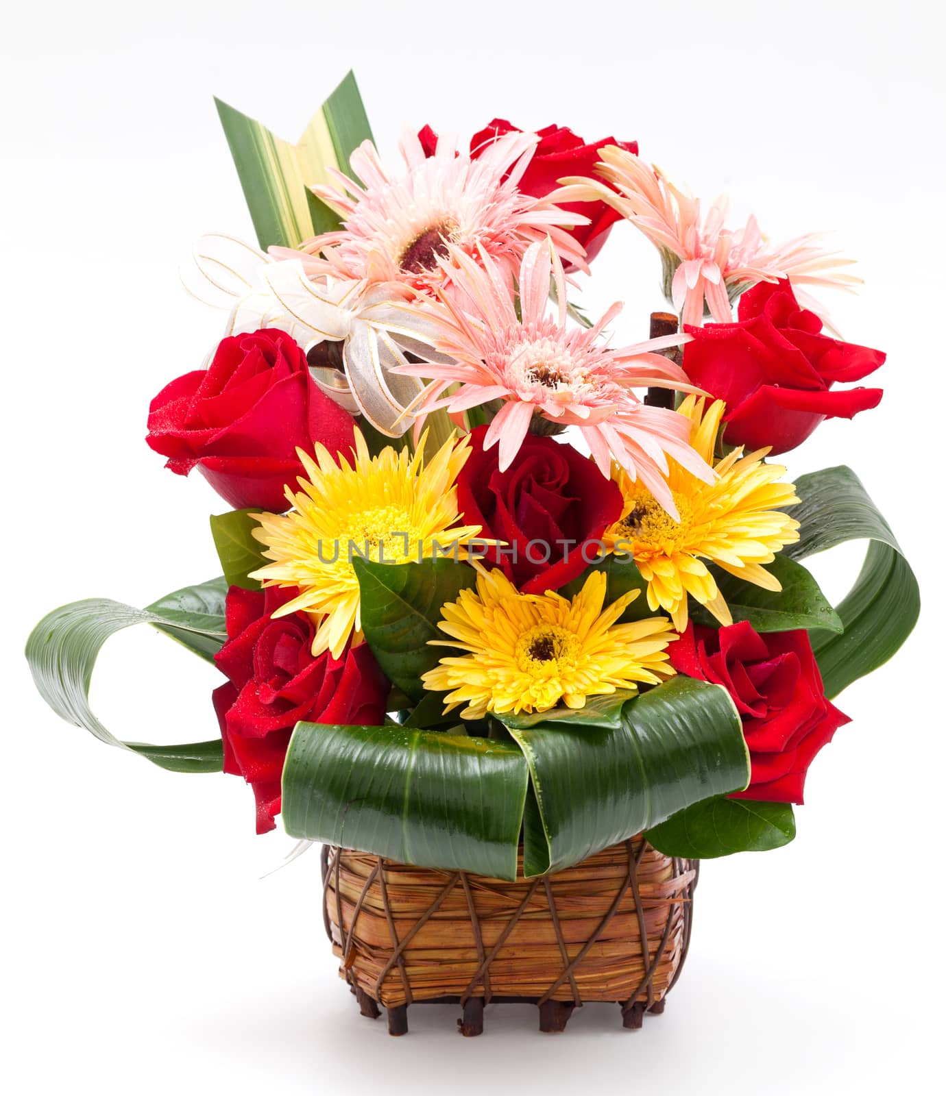 rose and gerbera in basket