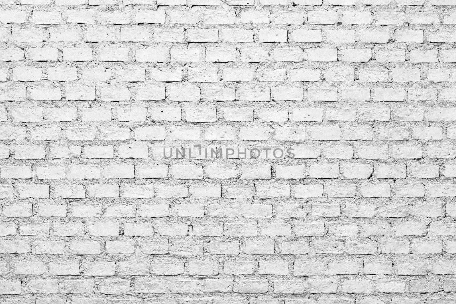 a background of a white brick wall