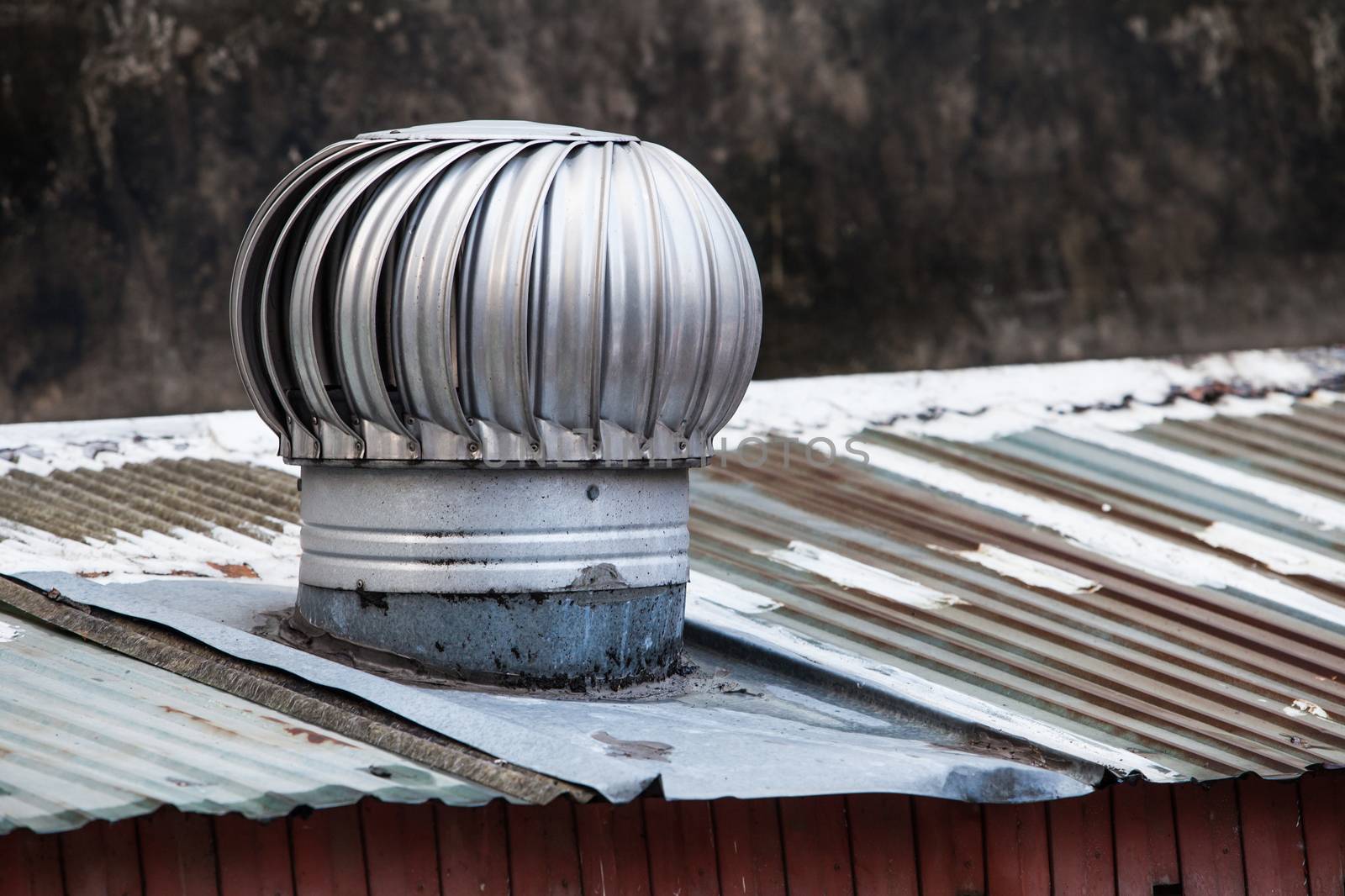 Roof Ventilator on a  old rusty roof