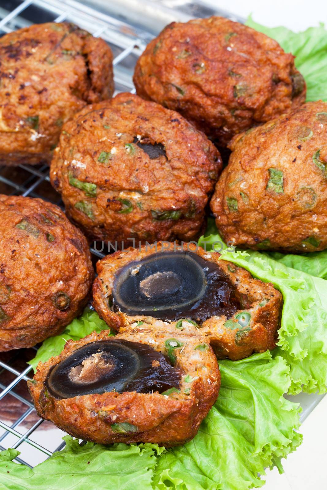 preserved egg wraped by fried fish-paste ball (new menu of thai food)