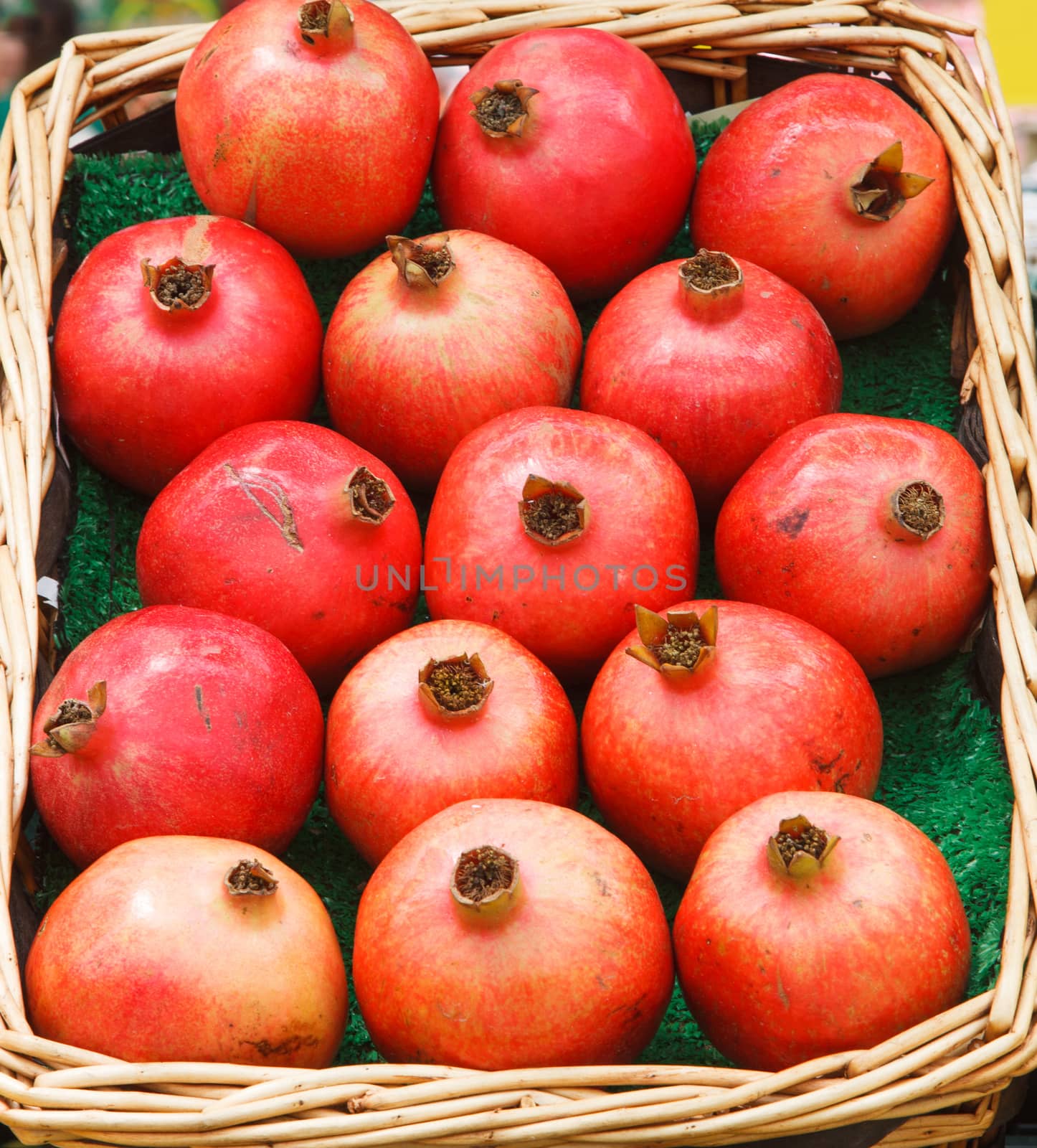 close up pomegranate in basket