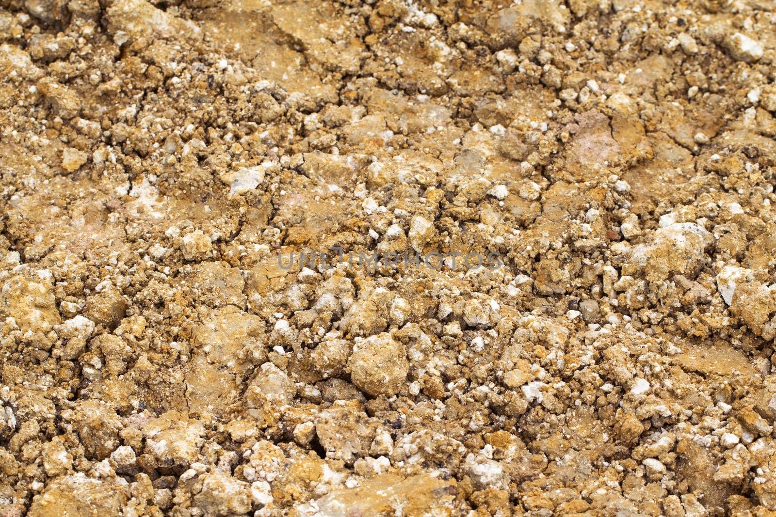 natural brown soil and pebble pattern on ground