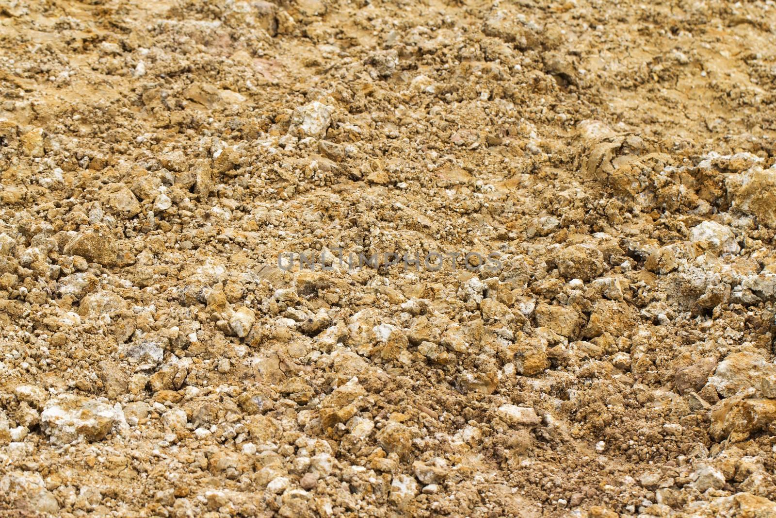 natural brown soil and pebble pattern on ground