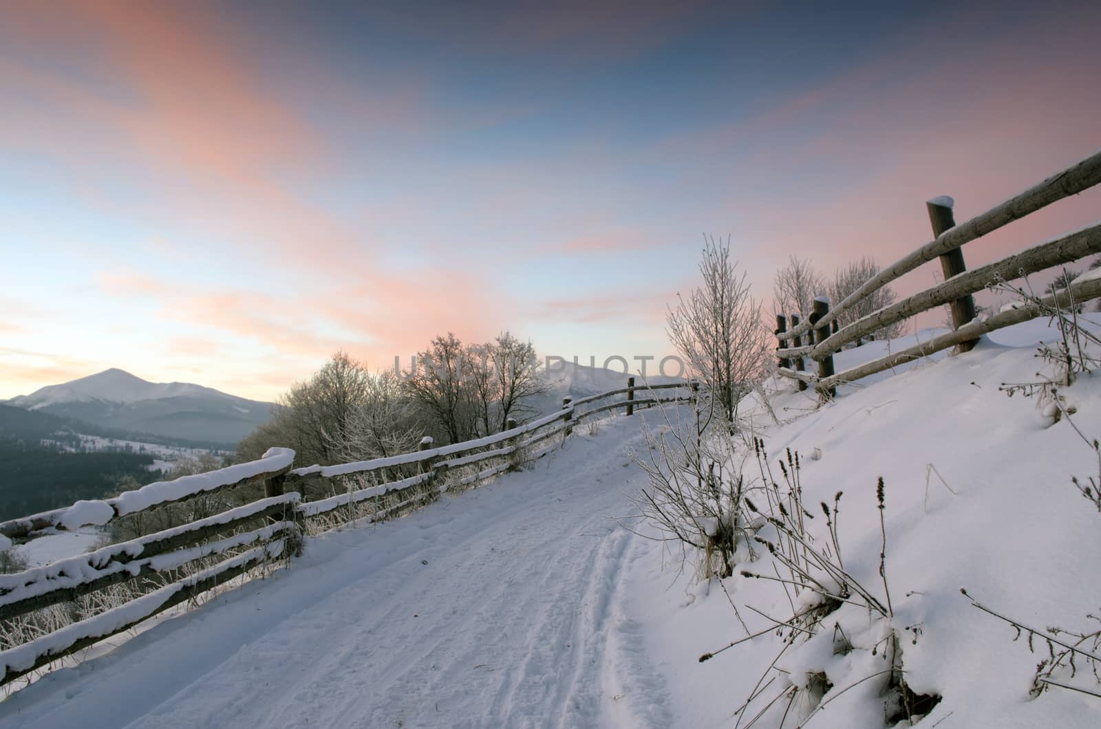 Carpathian mountain valley covered with fresh snow. Majestic landscape. Ukraine, Europe