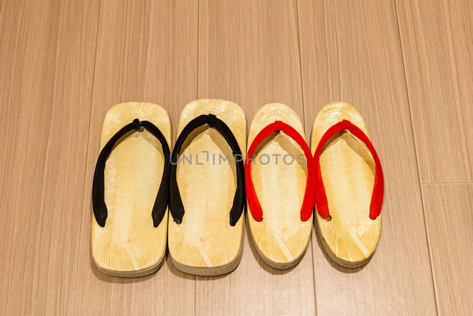 Zori sandal on wooden floor.