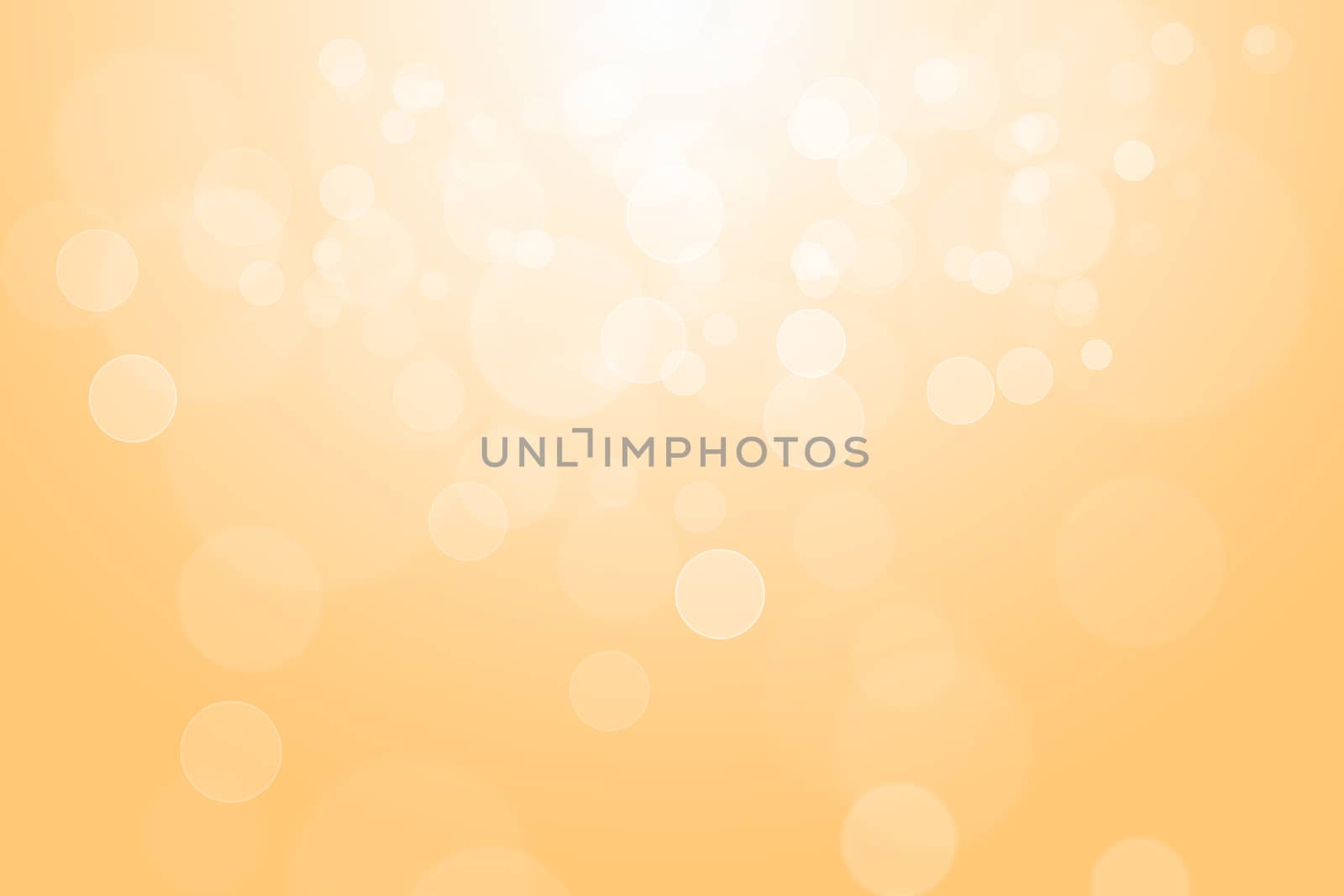 Orange glowing bokeh abstract background use for wallpaper.