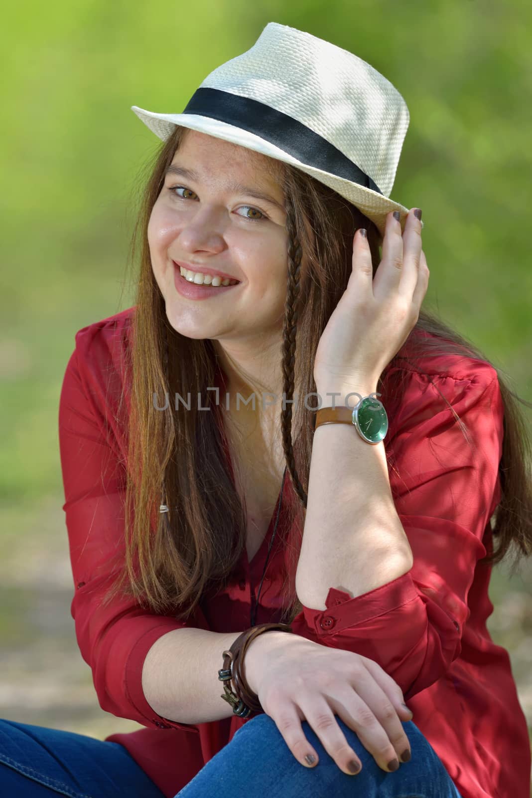 Portrait  young girl with hat in nature