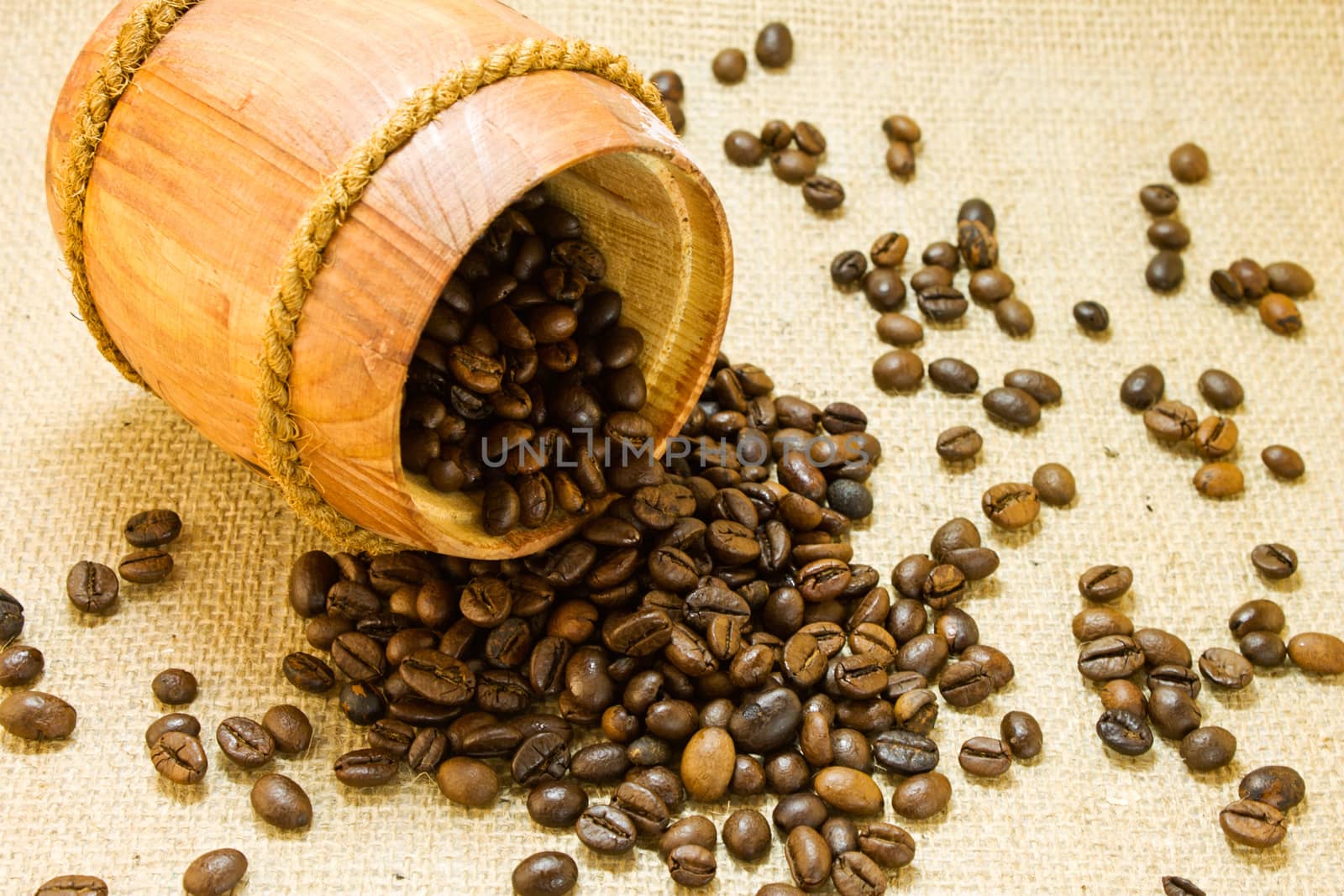 Coffee beans in a wooden keg by LenoraA