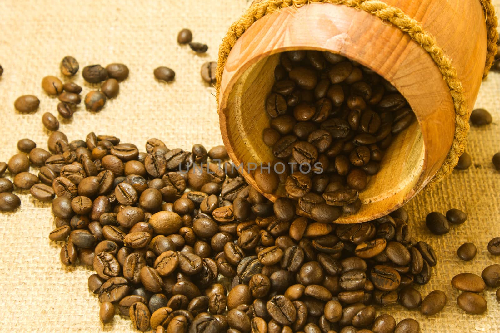 Coffee beans in a wooden keg by LenoraA
