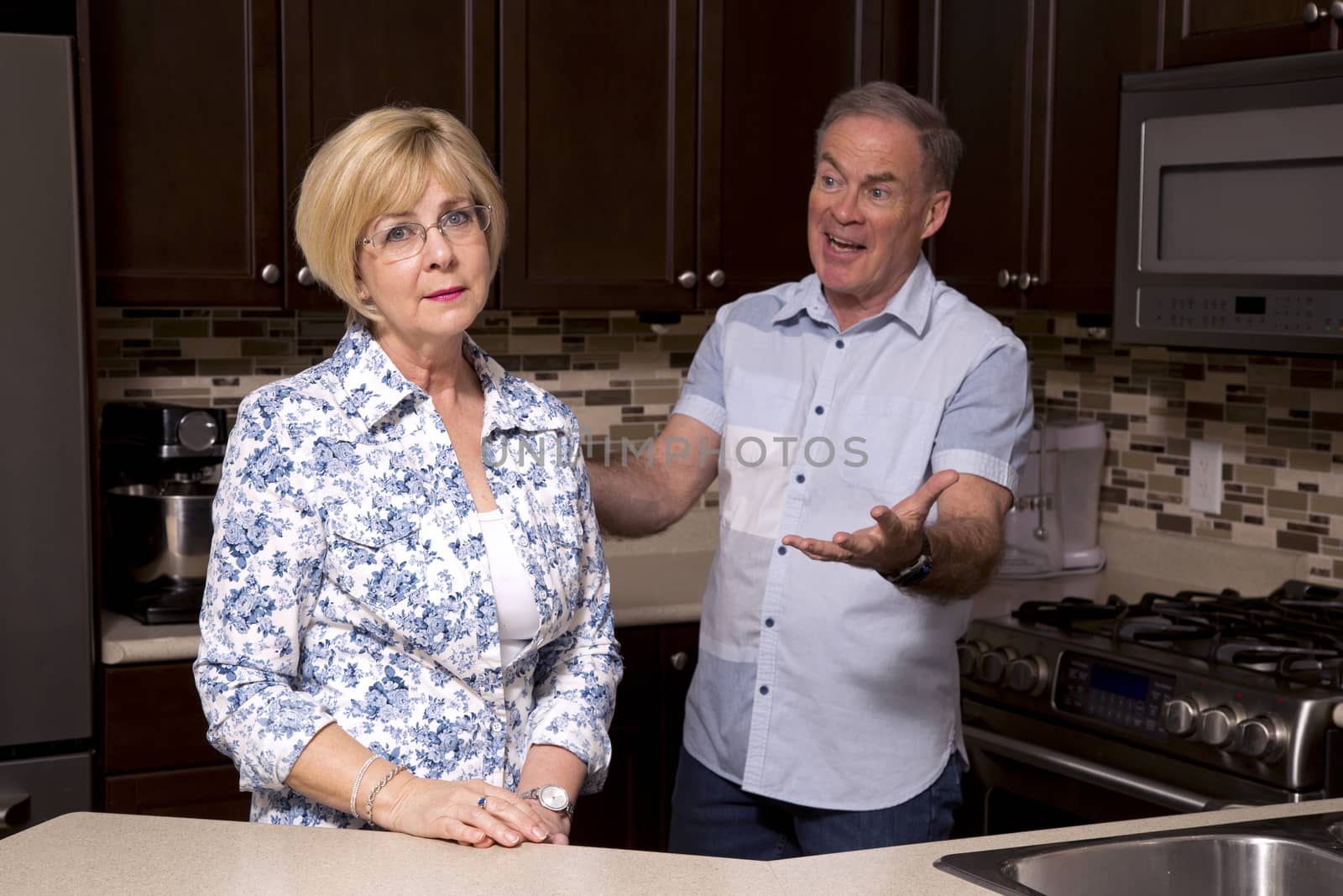 retired couple in the kitchen by zdenkadarula