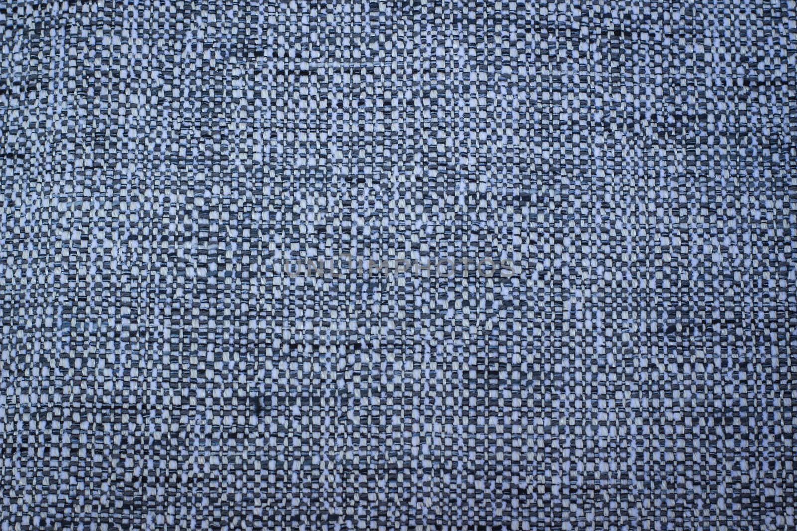 Rustic canvas fabric texture in blue color.