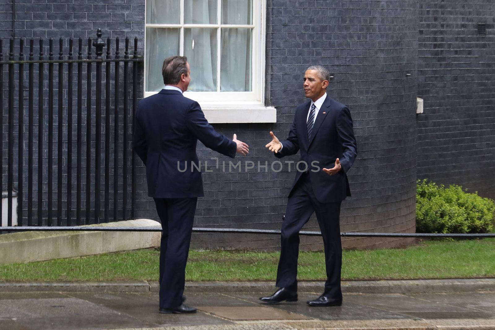 UNITED-KINGDOM, London: President Barack Obama (R) greets British Prime Minister David Cameron (L) as they meet at Downing Street on April 22, 2016 in London, United-Kingdom. The President and his wife are currently on a brief visit to the UK where they will have lunch with HM Queen Elizabeth II at Windsor Castle and dinner with Prince William and his wife Catherine, Duchess of Cambridge at Kensington Palace. 