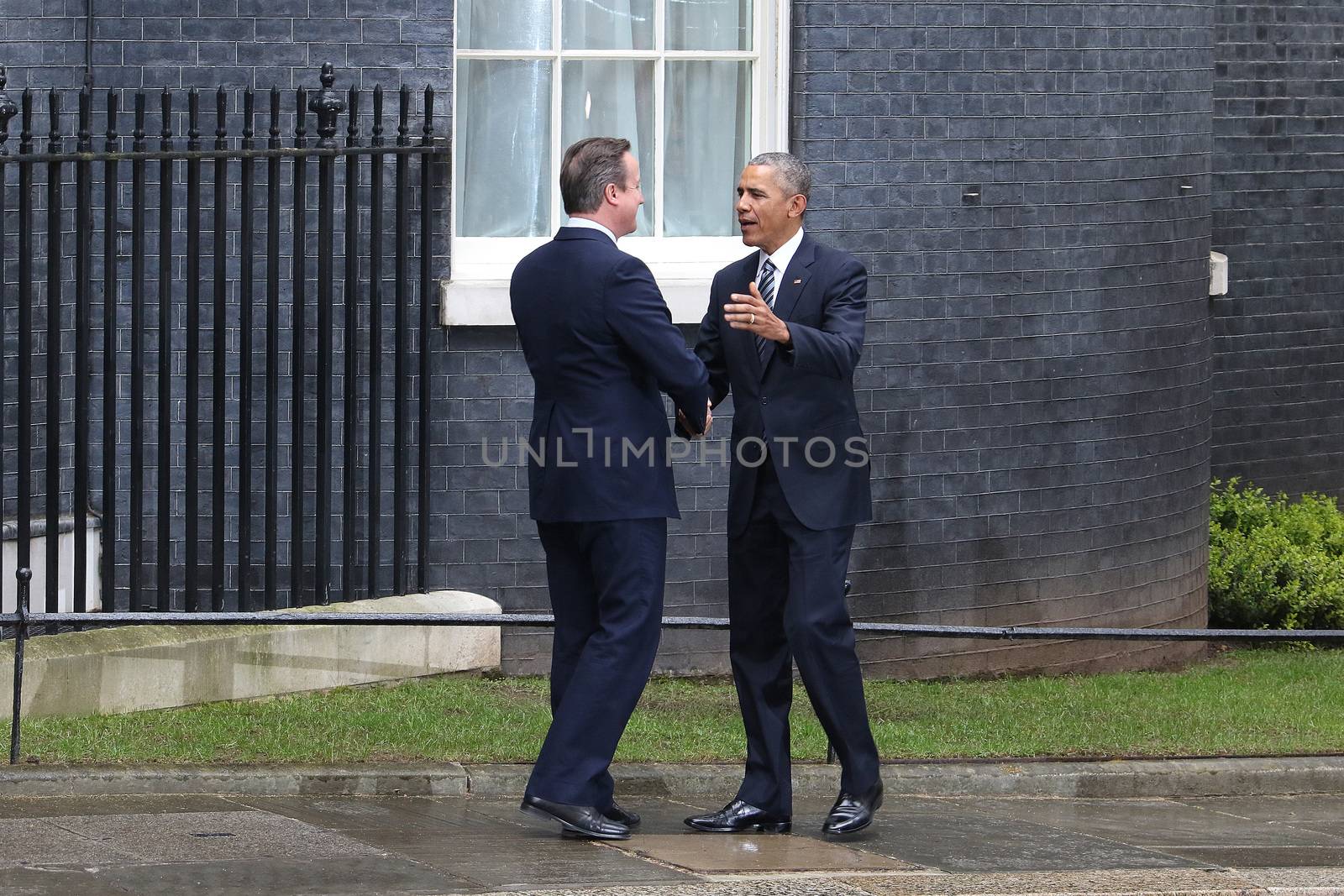 UNITED-KINGDOM, London: President Barack Obama (R) greets British Prime Minister David Cameron (L) as they meet at Downing Street on April 22, 2016 in London, United-Kingdom. The President and his wife are currently on a brief visit to the UK where they will have lunch with HM Queen Elizabeth II at Windsor Castle and dinner with Prince William and his wife Catherine, Duchess of Cambridge at Kensington Palace. 