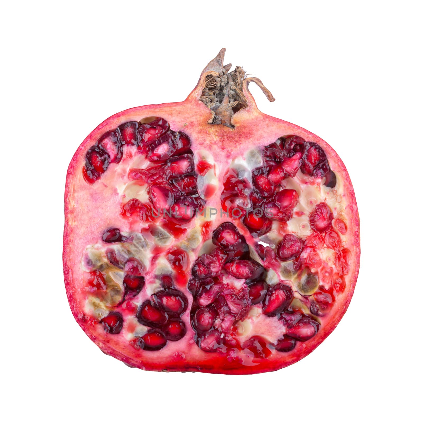 Cut pomegranate isolated on a white background