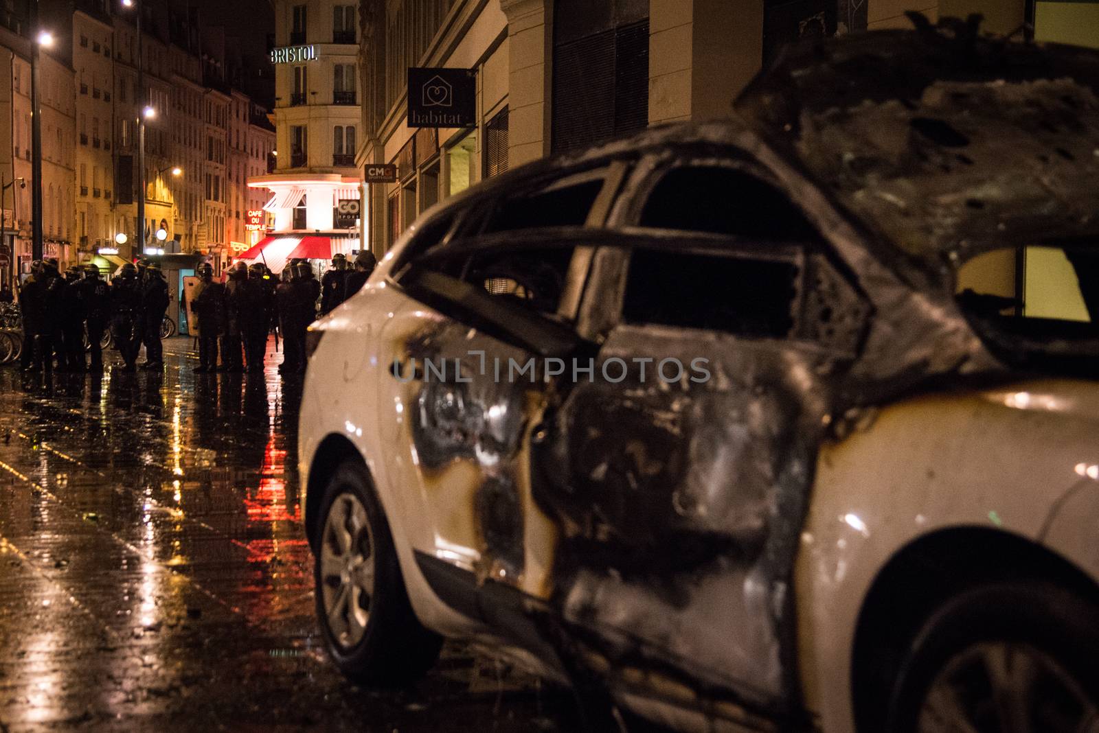 FRANCE, Paris: A burned down unmarked police vehicle is pictured near the Place de la République in Paris following violent protests during rally by the Nuit Debout (Up All Night) movement, on April 23, 2016. The Nuit Debout or Up All Night protests began in opposition to the Socialist government's labour reforms seen as threatening workers' rights, but have since gathered a number of causes, from migrants' rights to anti-globalisation.