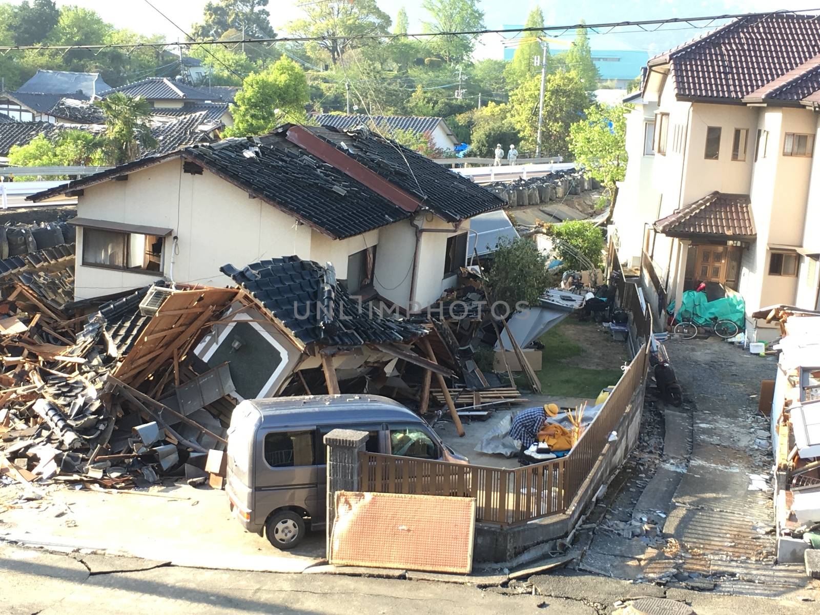 JAPAN, Mashiki: A collapsed house is pictured following an earthquake, on April 20, 2016 in Mashiki near Kumamoto, Japan. As of April 20, 48 people were confirmed dead after strong earthquakes rocked Kyushu Island of Japan. Nearly 11,000 people are reportedly evacuated after the tremors Thursday night at magnitude 6.5 and early Saturday morning at 7.3.