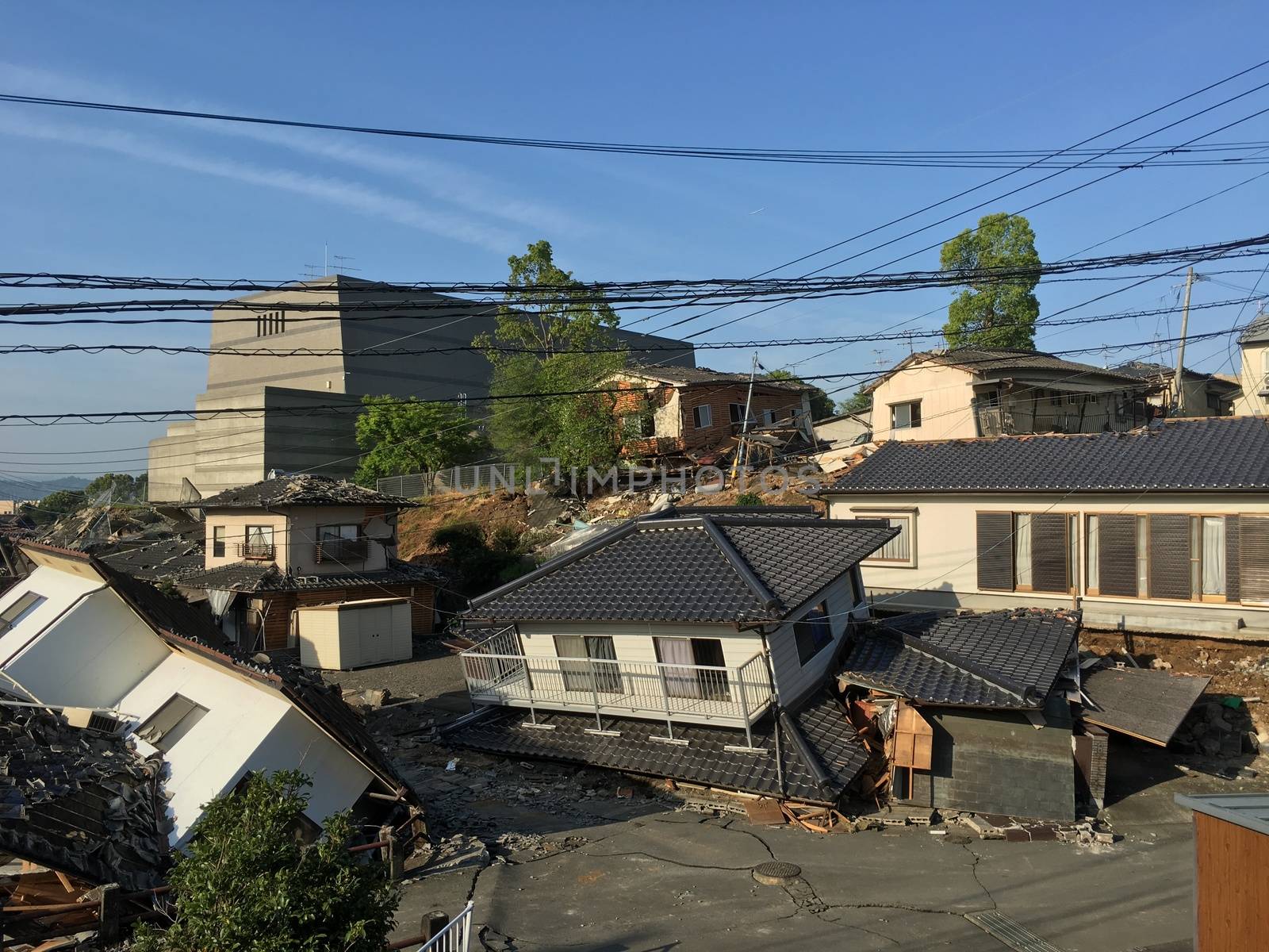 JAPAN, Mashiki: A collapsed house is pictured following an earthquake, on April 20, 2016 in Mashiki near Kumamoto, Japan. As of April 20, 48 people were confirmed dead after strong earthquakes rocked Kyushu Island of Japan. Nearly 11,000 people are reportedly evacuated after the tremors Thursday night at magnitude 6.5 and early Saturday morning at 7.3.