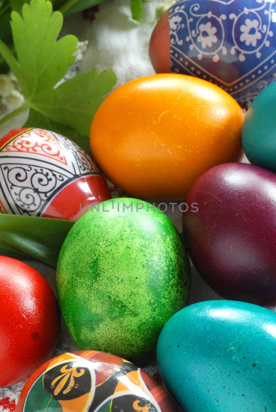 many various colorful easter eggs vertical background