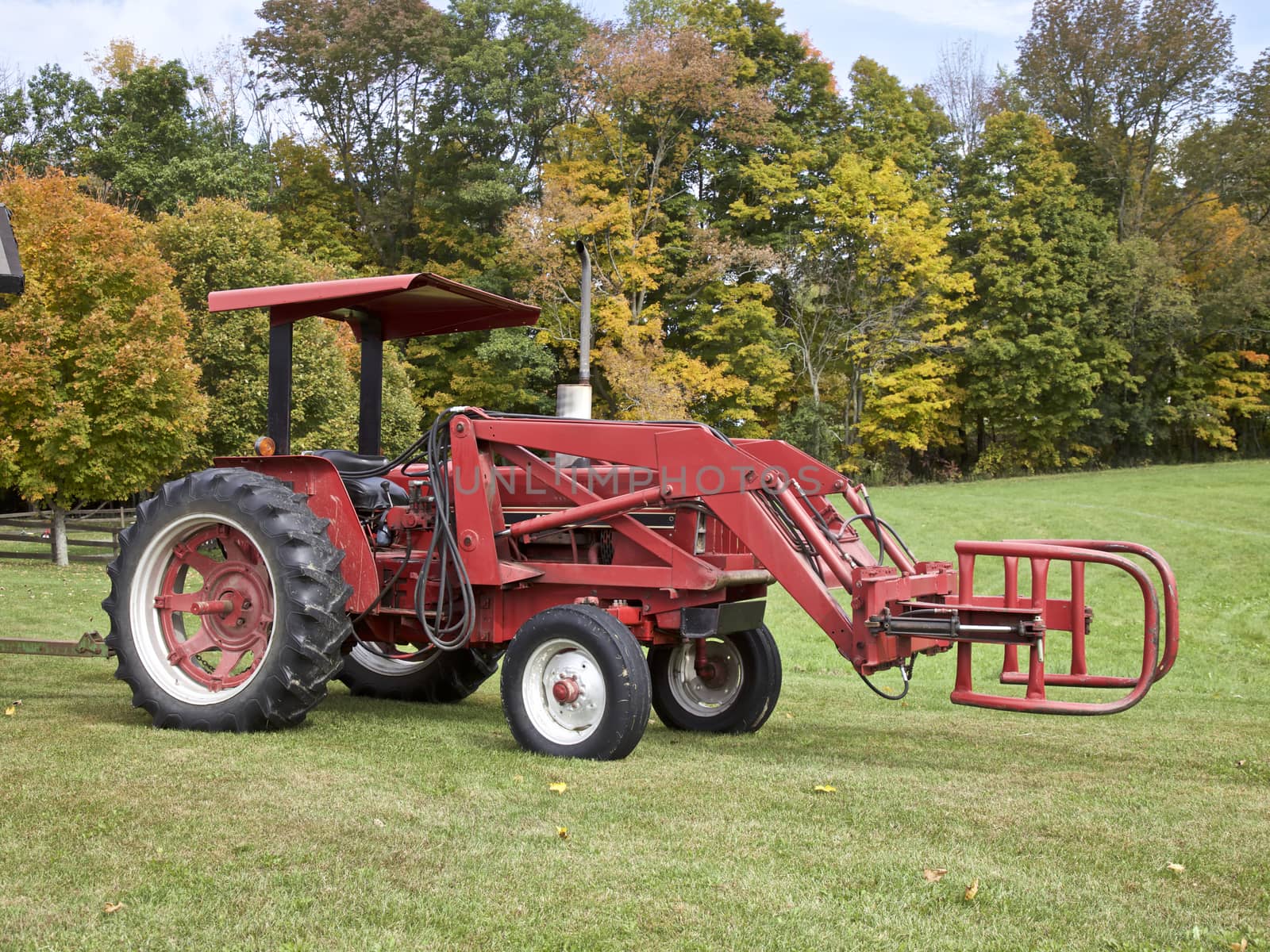 Farmers tractor with Autumn Foliage in Vermont, USA