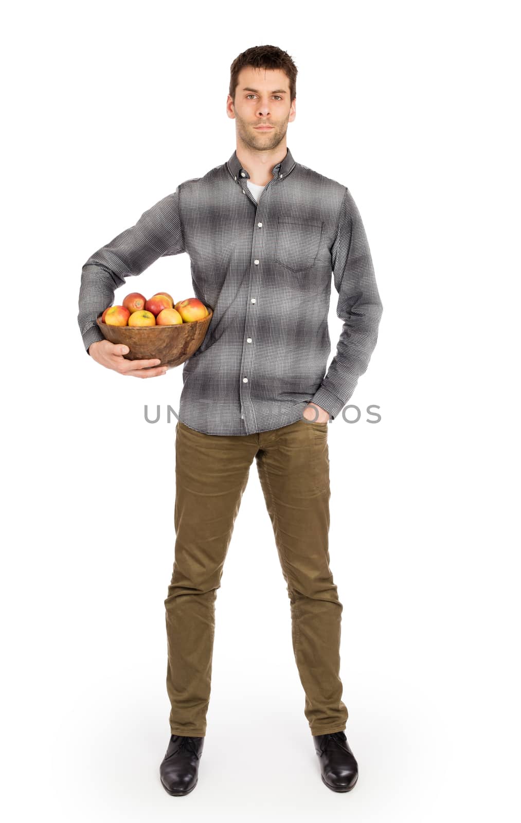 Healthy man with bowl full of apples, isolated on white
