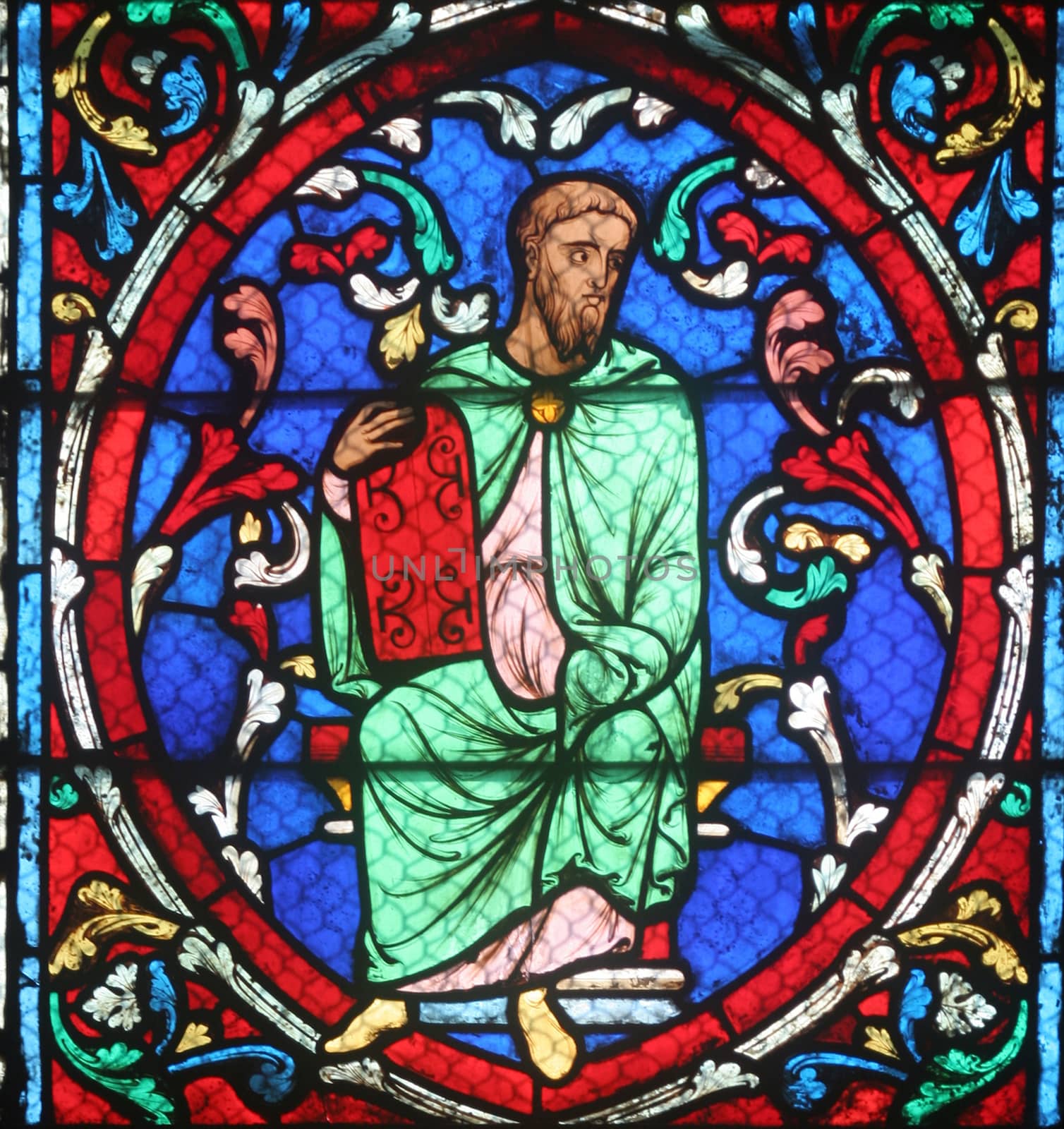 Colorful stained glass window in Cathedral Notre Dame de Paris