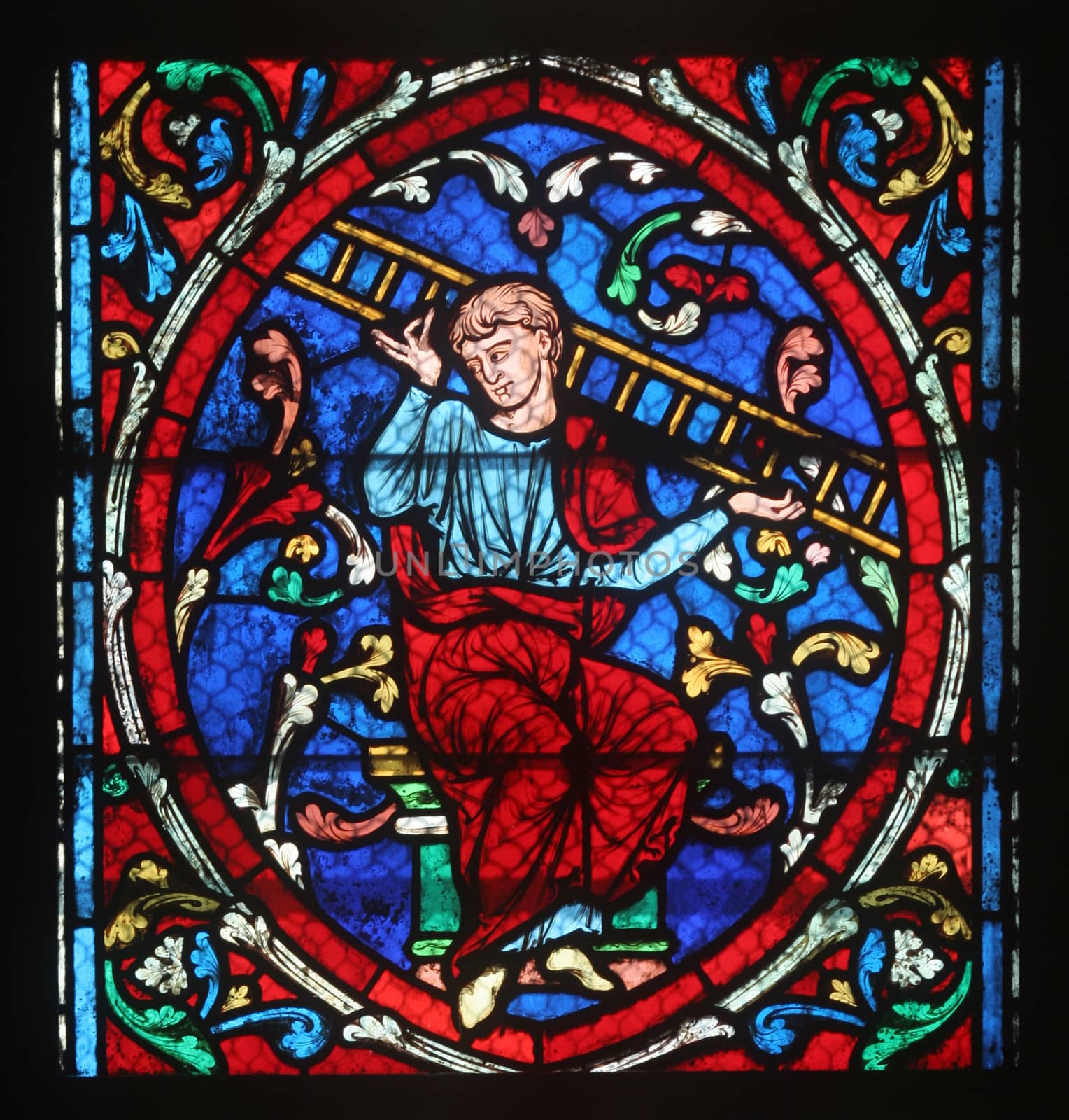 Colorful stained glass window in Cathedral Notre Dame de Paris