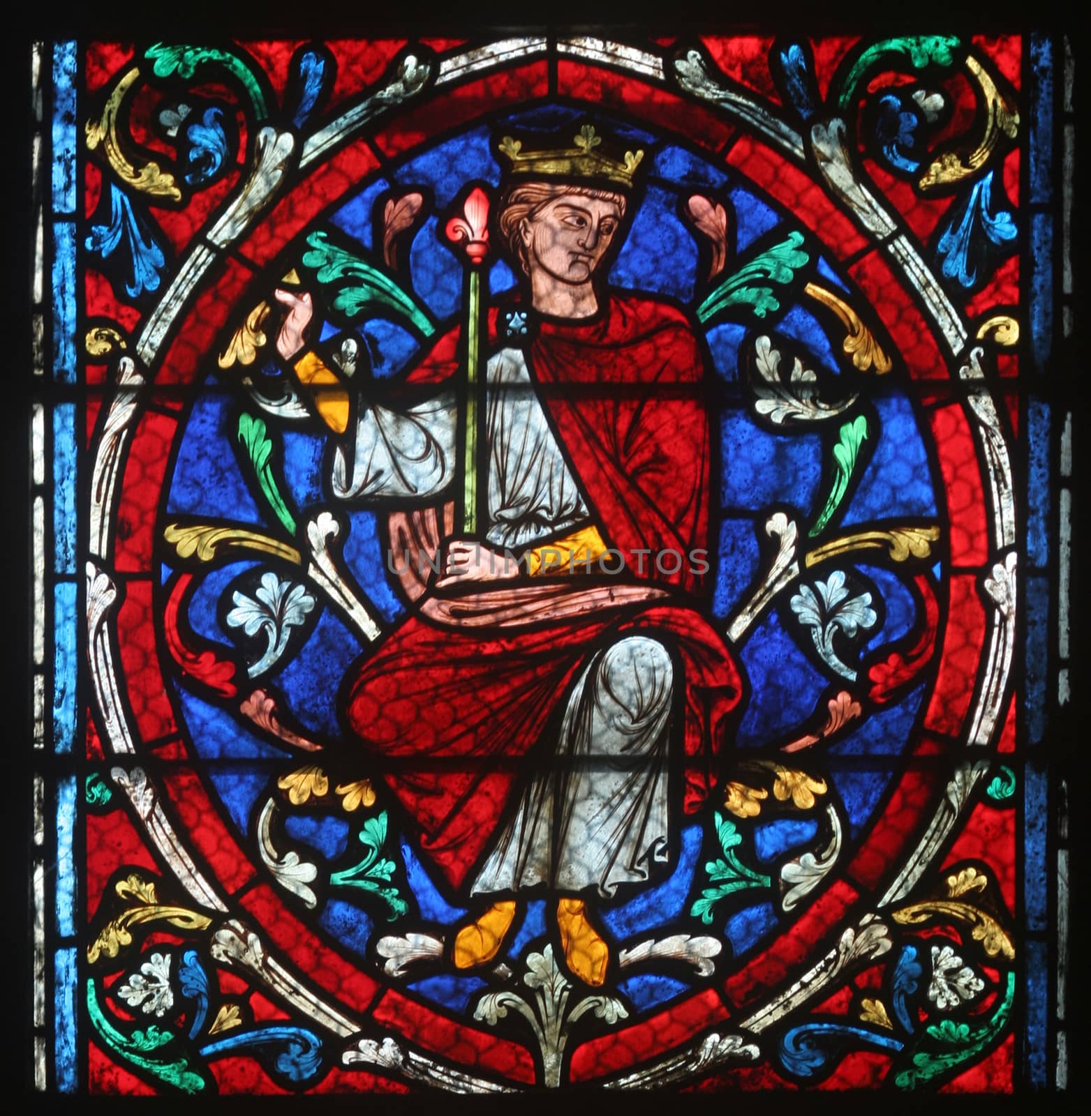 Colorful stained glass window in Cathedral Notre Dame de Paris