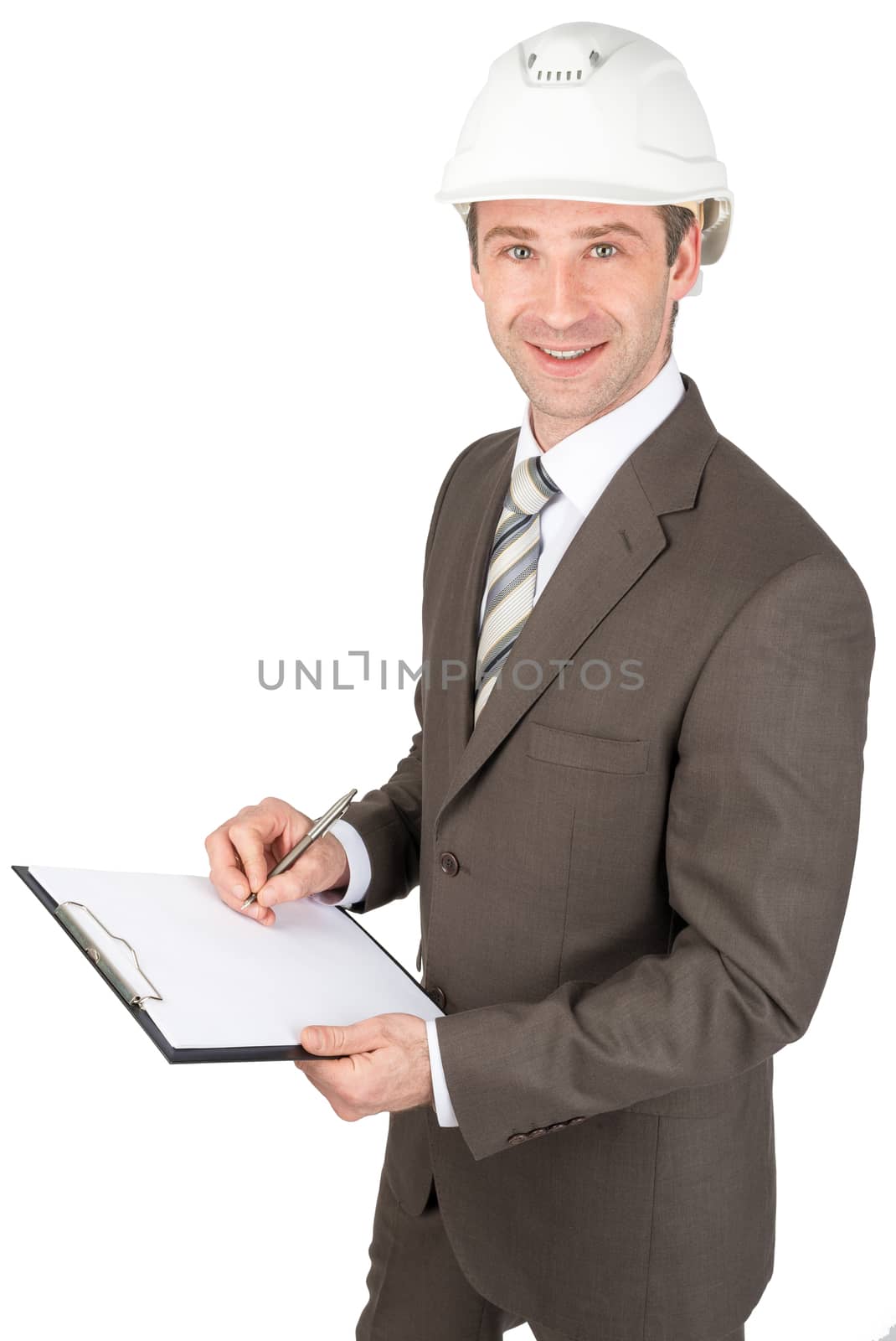 Smiling businessman in helmet holding papers isolated on white background