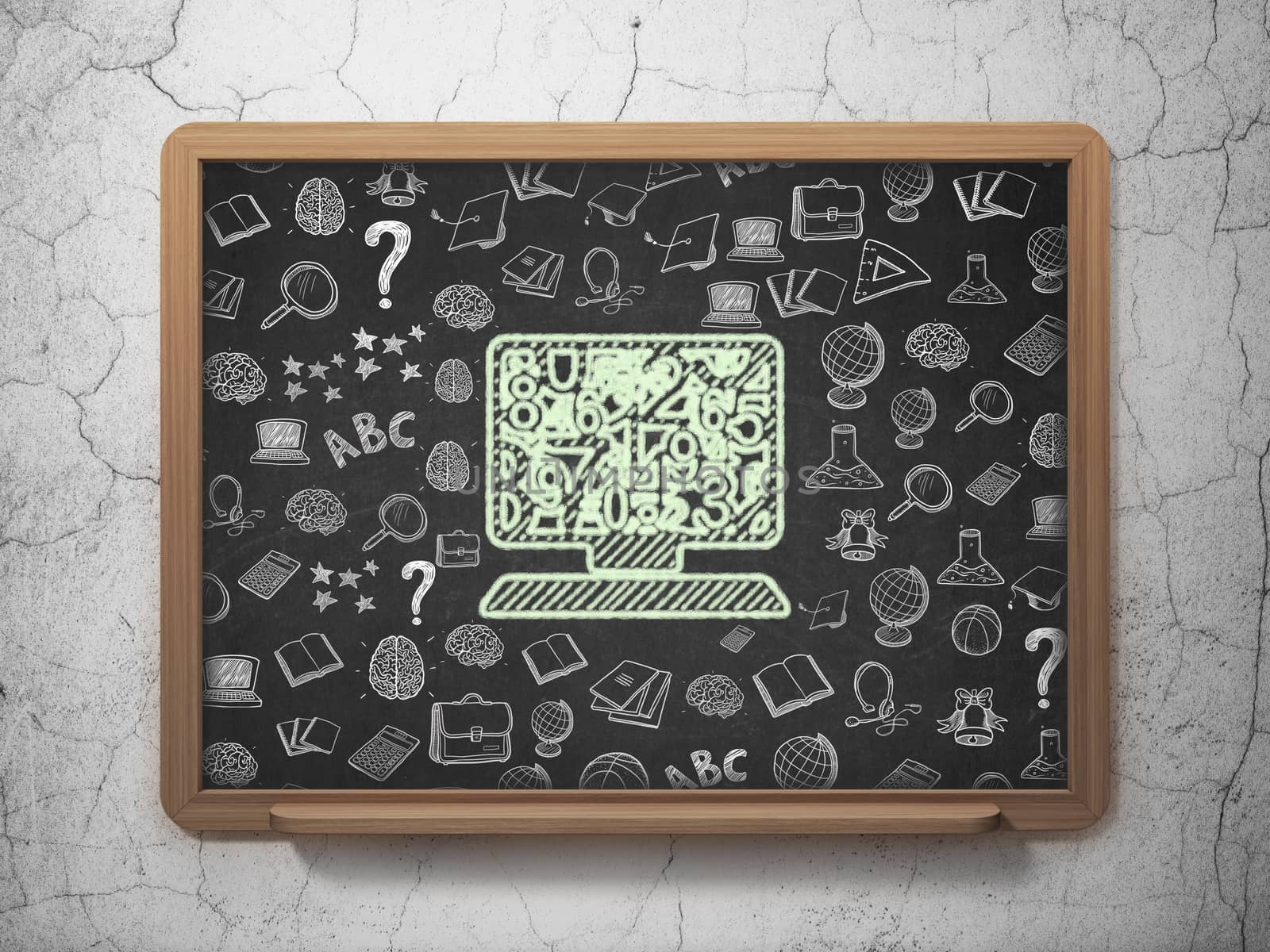 Learning concept: Computer Pc on School board background by maxkabakov