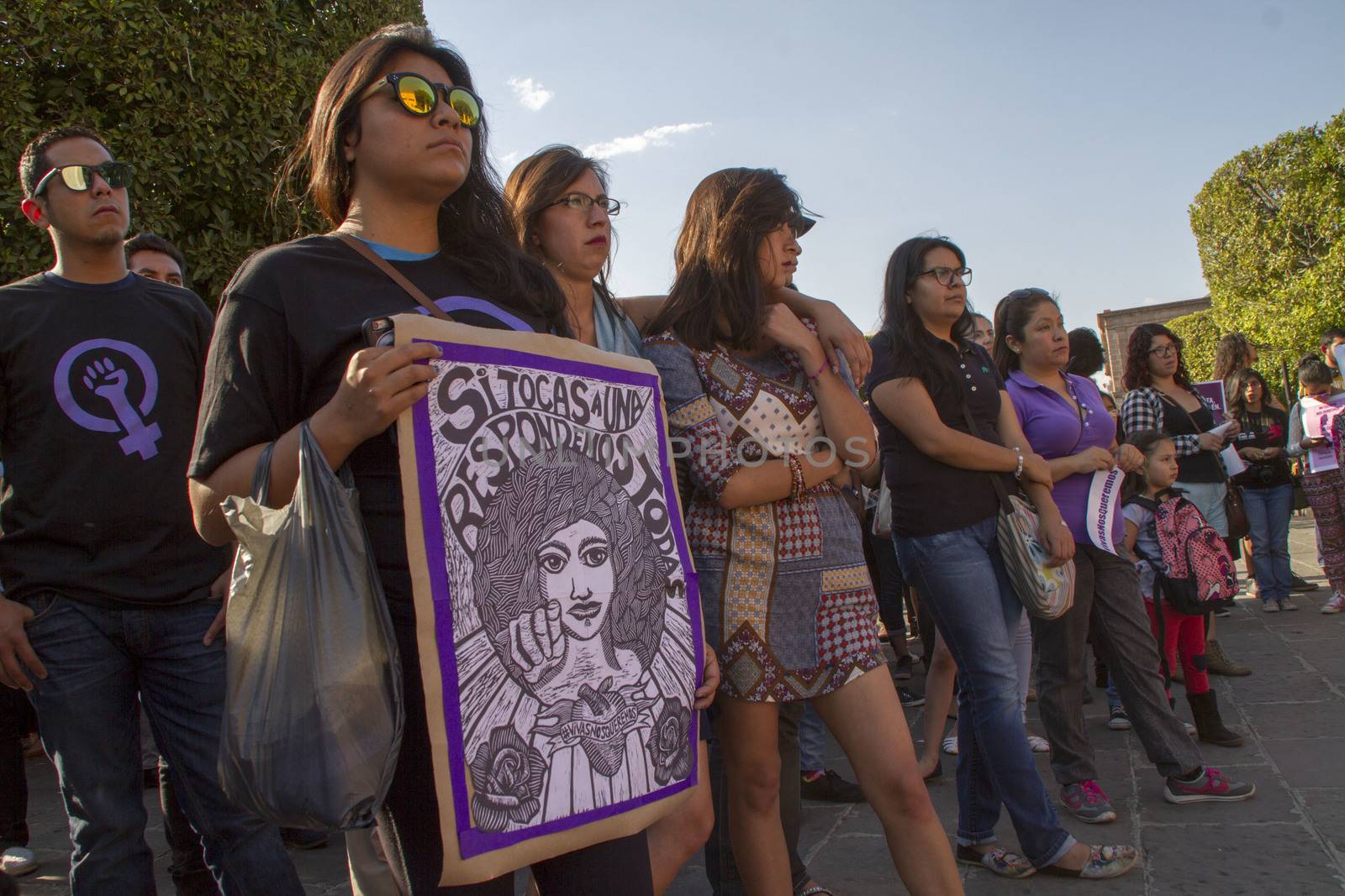 MEXICO, Morelia: Hundreds demonstrate against sexual violence to women and hold placards reading Vivas Nos Queremos, or We want to live at Plaza Benito Juarez, in Morelia, central Mexico, on April 24, 2016 as a group of women in Mexico have launched few days earlier a social media campaign encouraging people to speak out against sexual assault under the hashtag #NoTeCalles, or Don't Stay Silent. In June 2015, UN officials has said Mexico ranks among the world's 20 worst countries for violence against women. Several cities in the country held similar protest. 