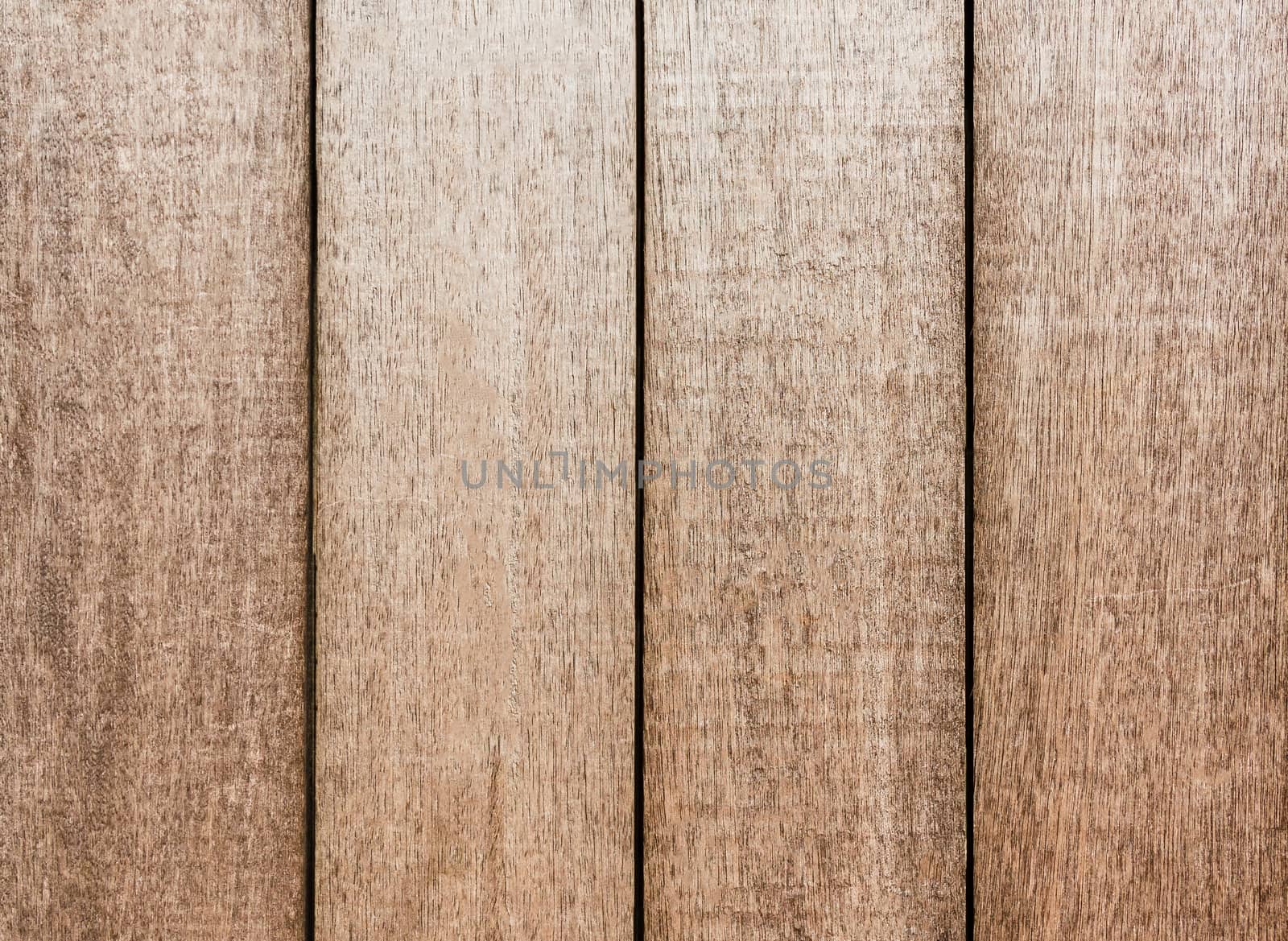 Grunged brown wood panel.