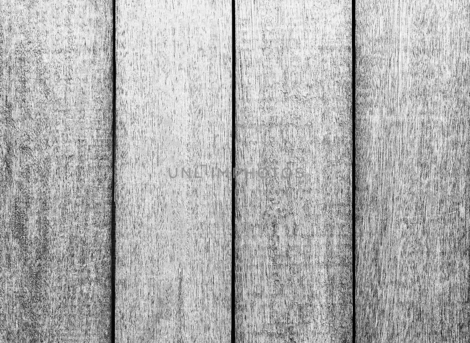 Grunged black and white wood panel.