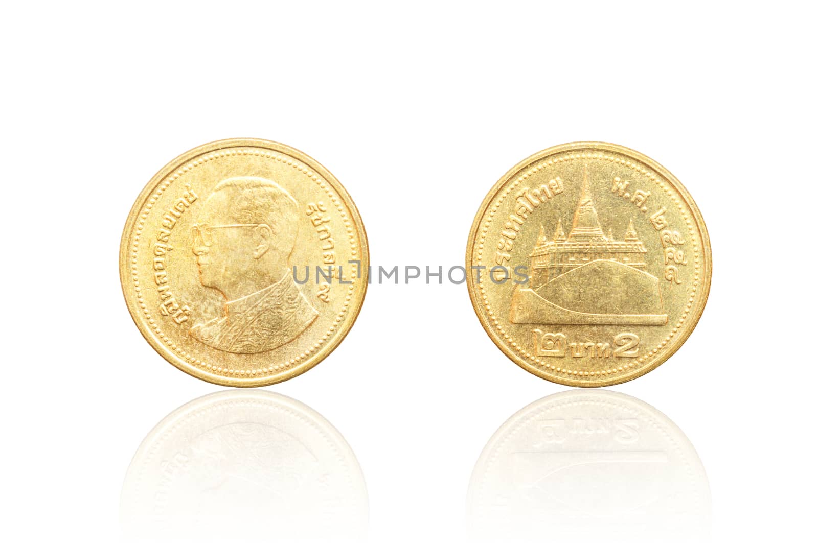Front and back of Thai coin 2 baht reflect on white background.