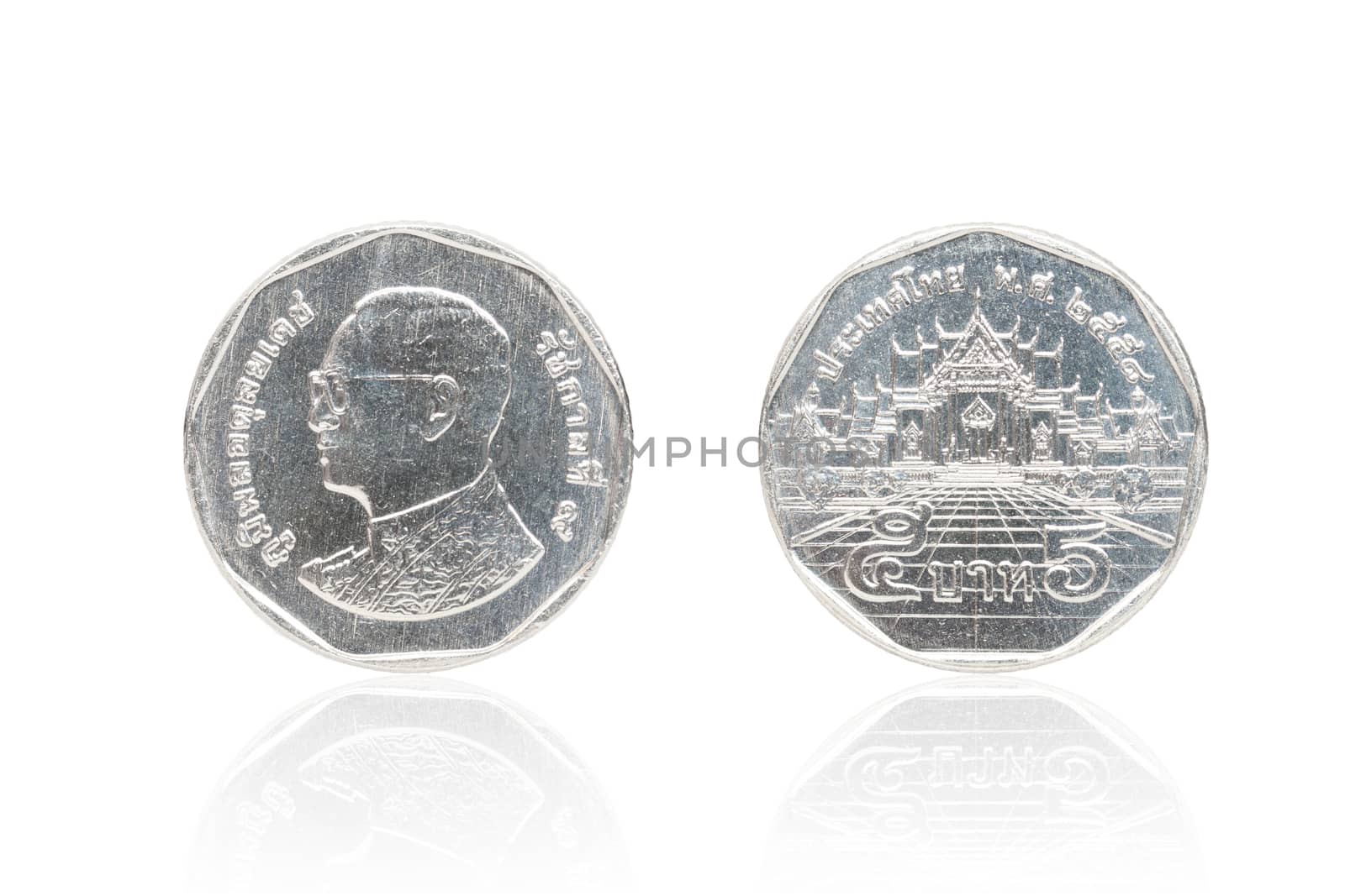 Front and back of Thai coin 5 baht reflect on white background.