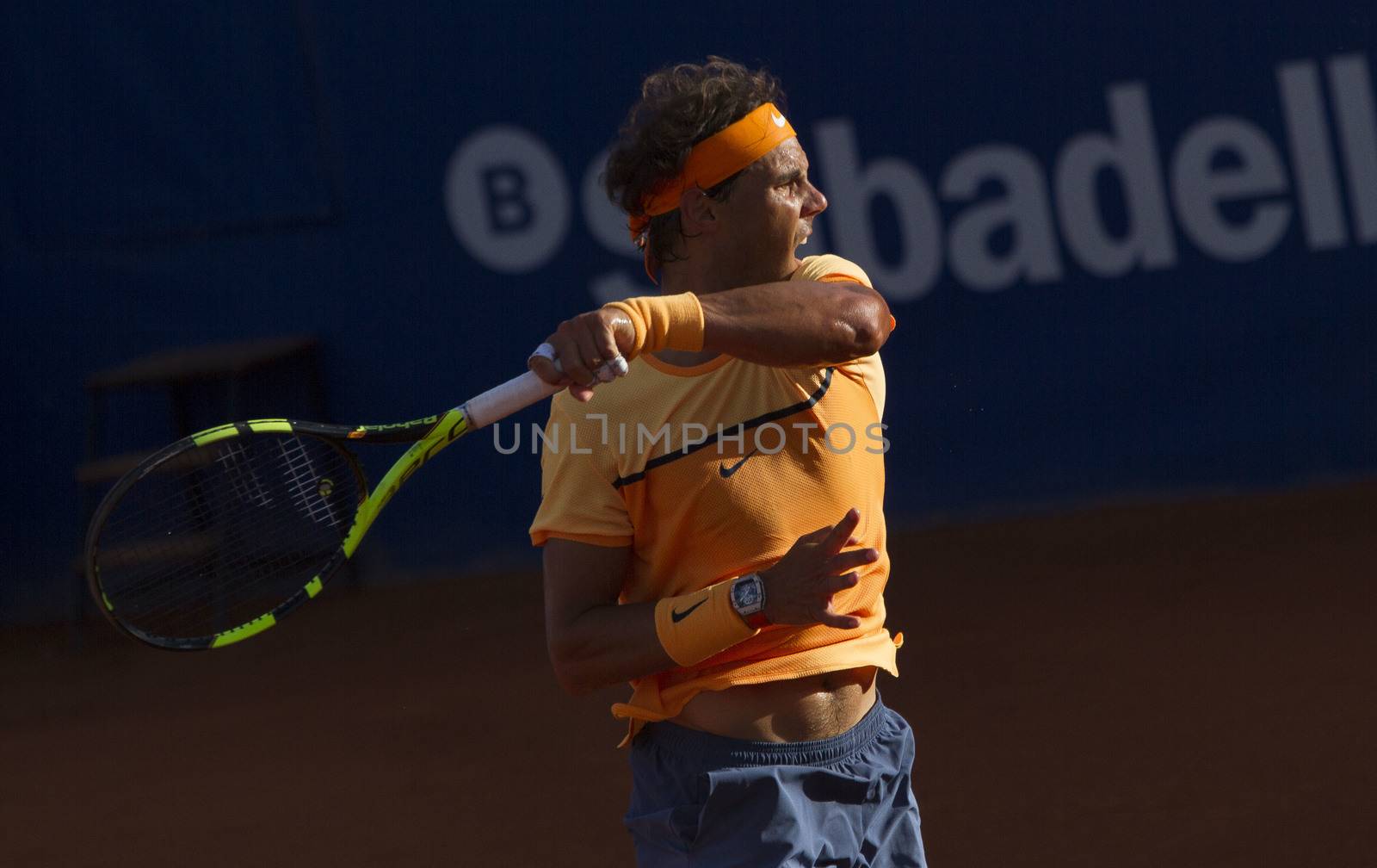 SPAIN, Barcelona: Spanish tennis player Rafael Nadal returns the ball to Japanese tennis player Kei Nishikori during the final of the ATP Barcelona Open Conde de Godo tennis tournament in Barcelona on April 24, 2015. Rafael Nadal equalled Argentine legend Guillermo Vilas's record of 49 clay-court titles with his ninth Barcelona Open after overcoming defending champion Kei Nishikori 6-4, 7-5 today. 