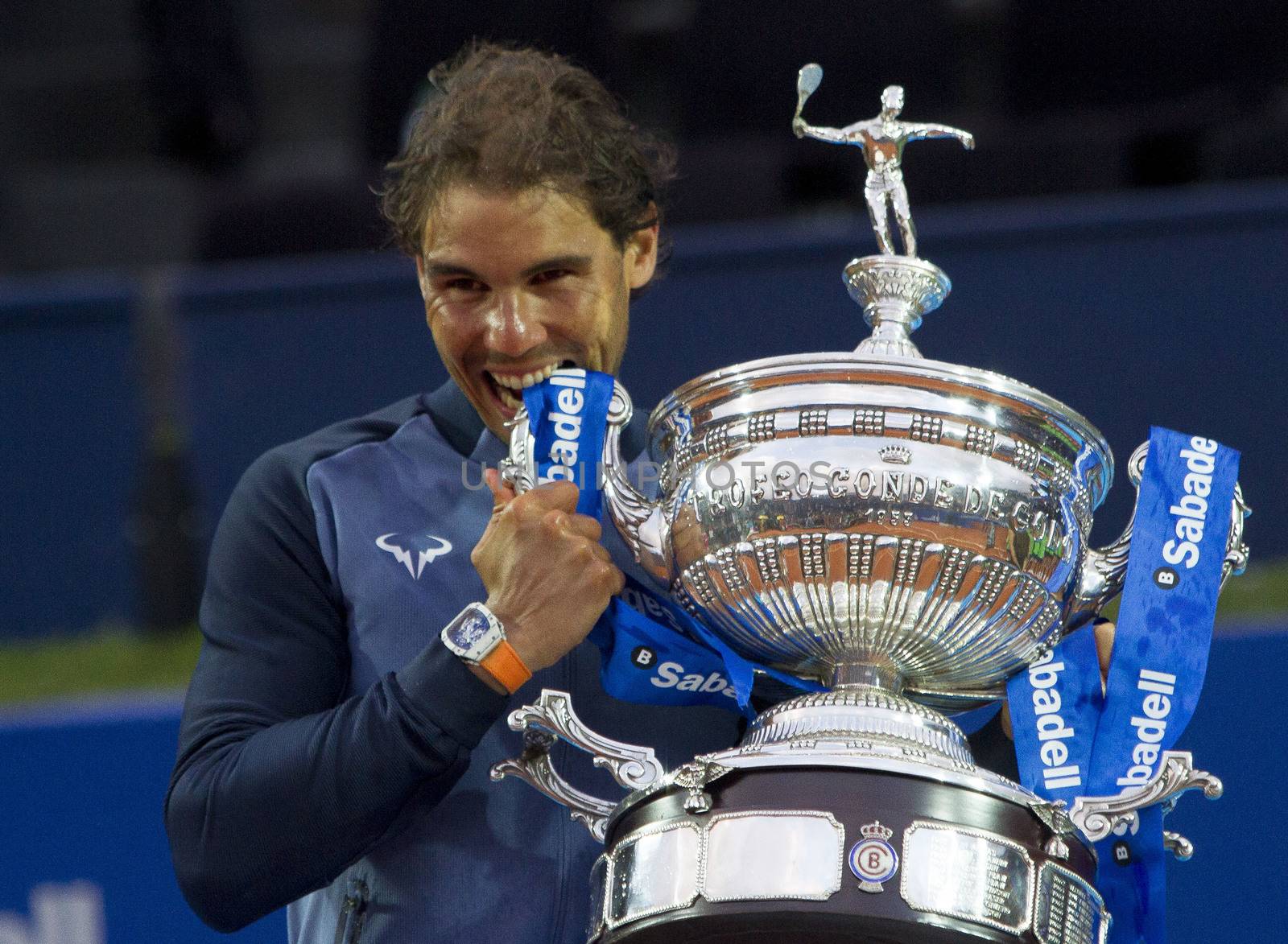 SPAIN, Barcelona: Spanish tennis player Rafael Nadal celebrates defeating Japanese tennis player Kei Nishikori during the final of the ATP Barcelona Open Conde de Godo tennis tournament in Barcelona on April 24, 2015. Rafael Nadal equalled Argentine legend Guillermo Vilas's record of 49 clay-court titles with his ninth Barcelona Open after overcoming defending champion Kei Nishikori 6-4, 7-5 today. 