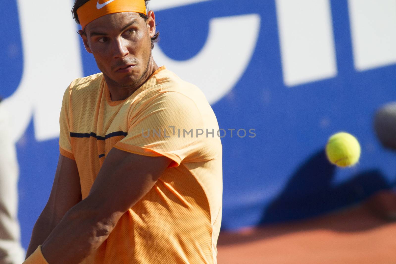 SPAIN, Barcelona: Spanish tennis player Rafael Nadal returns the ball to Japanese tennis player Kei Nishikori during the final of the ATP Barcelona Open Conde de Godo tennis tournament in Barcelona on April 24, 2015. Rafael Nadal equalled Argentine legend Guillermo Vilas's record of 49 clay-court titles with his ninth Barcelona Open after overcoming defending champion Kei Nishikori 6-4, 7-5 today. 