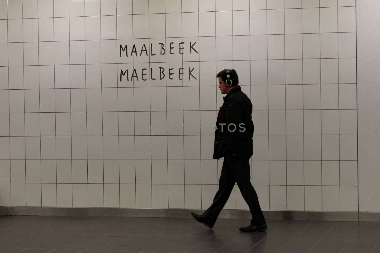 BELGIUM, Brussels : Passagers walk during the reopening of the Maelbeek - Maalbeek metro station on on April 25, 2016 in Brussels, which was closed since the 22 March attacks in the Belgian capital.Maelbeek - Maalbeek metro station was hit by one of the three Islamic State suicide bombers who struck Brussels airport and metro on March 22, killing 32 people and injuring hundreds.