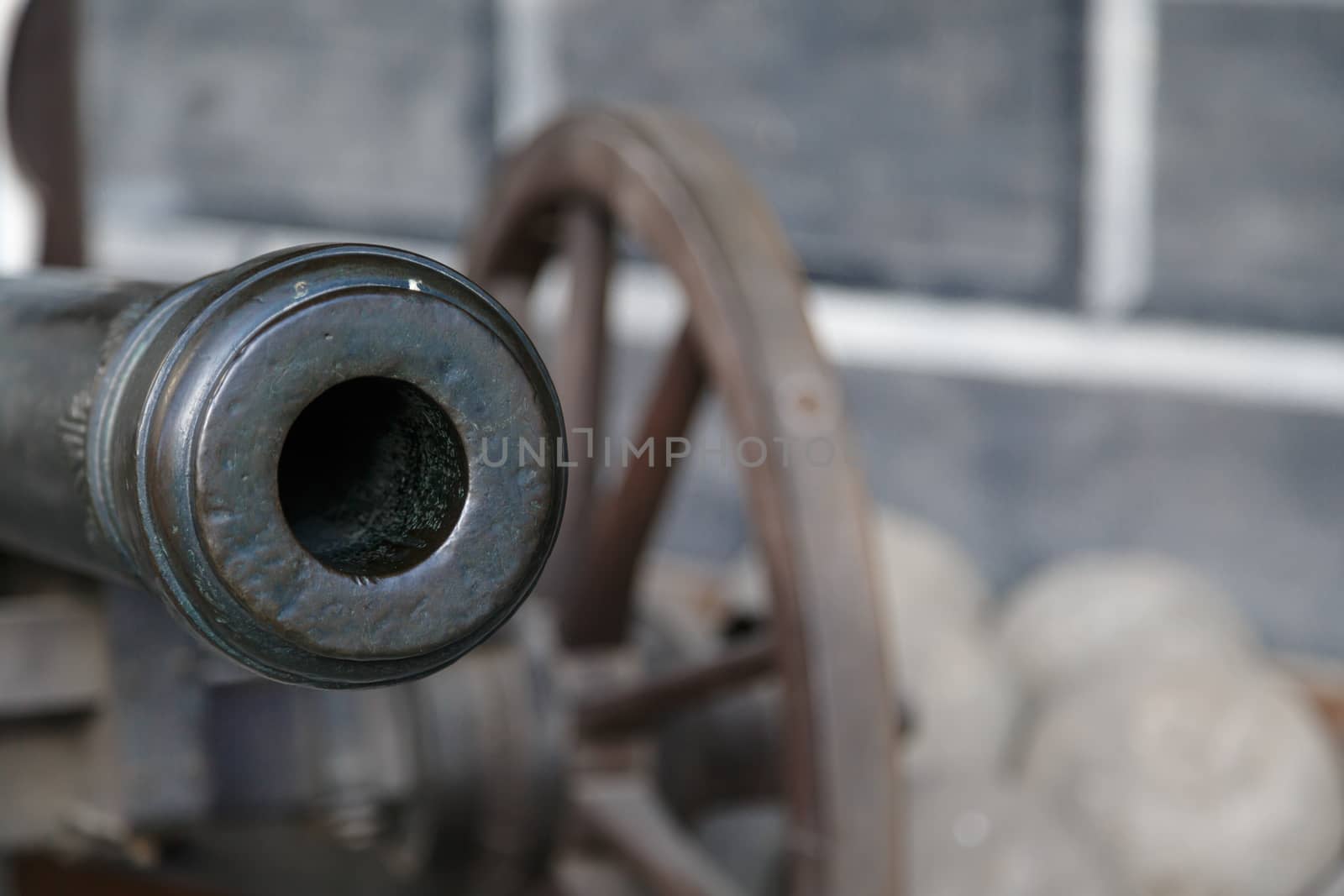 Close up detailed view of old black iron cannon ball.